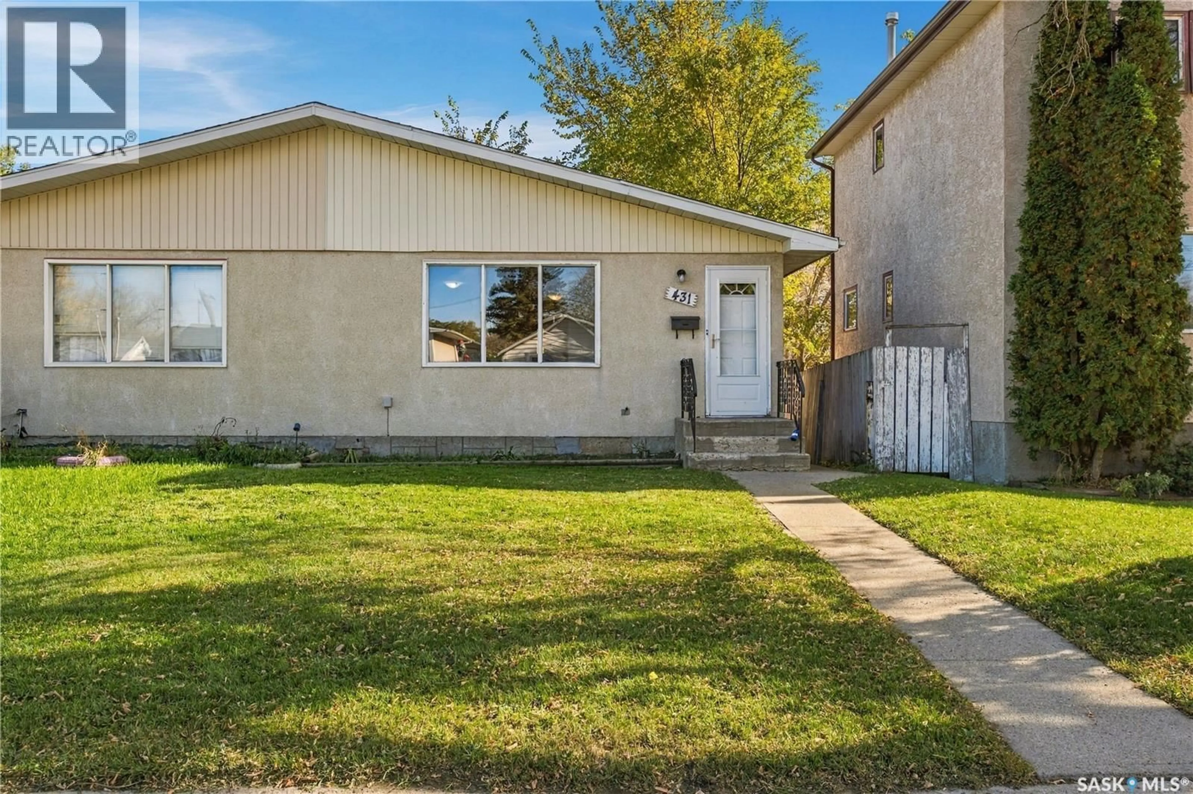 Home with vinyl exterior material, street for 431 YORK STREET, Regina Saskatchewan S4R4W7