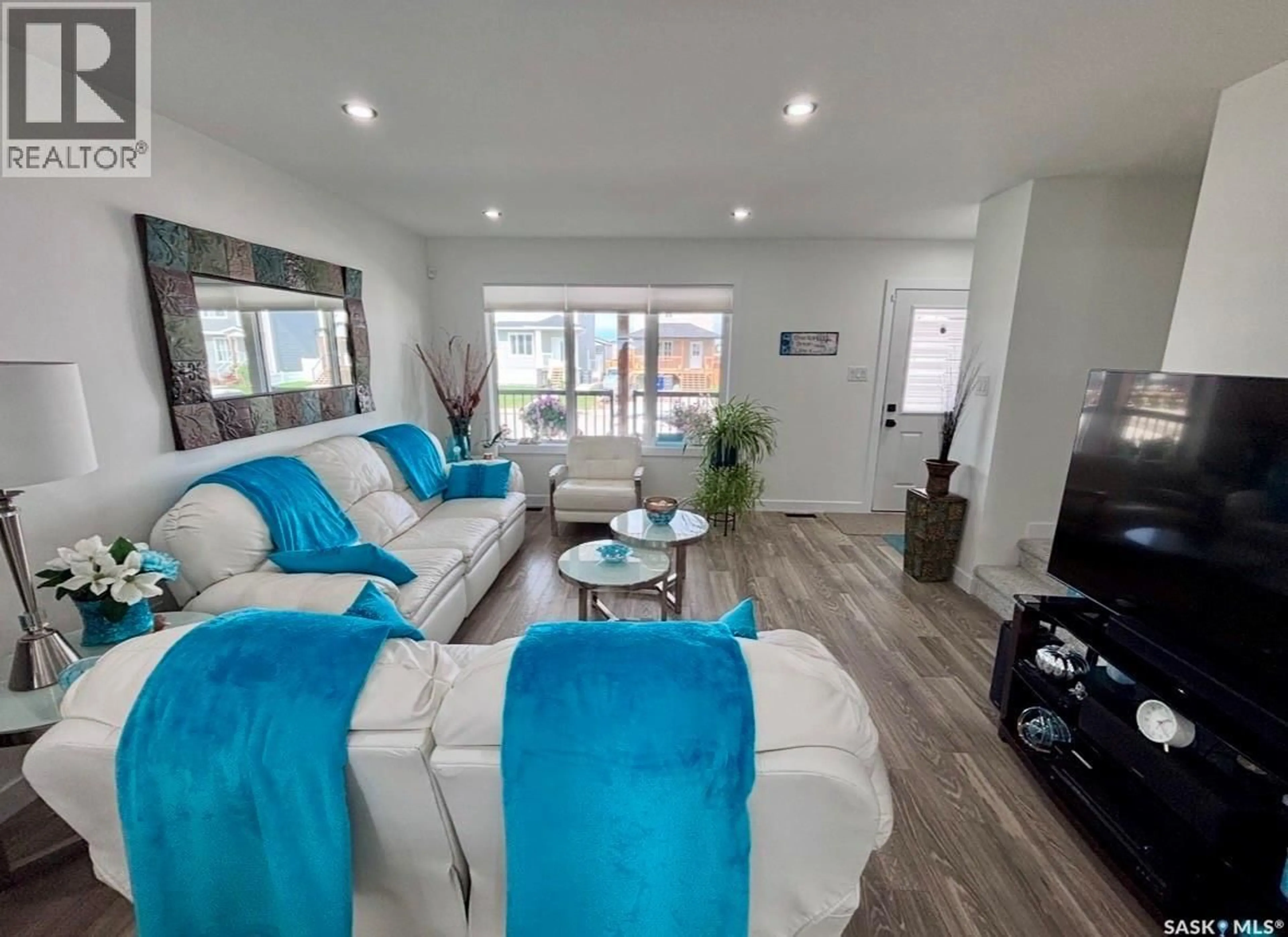 Living room with furniture, unknown for 415 ELDORADO STREET, Warman Saskatchewan S0K4S0
