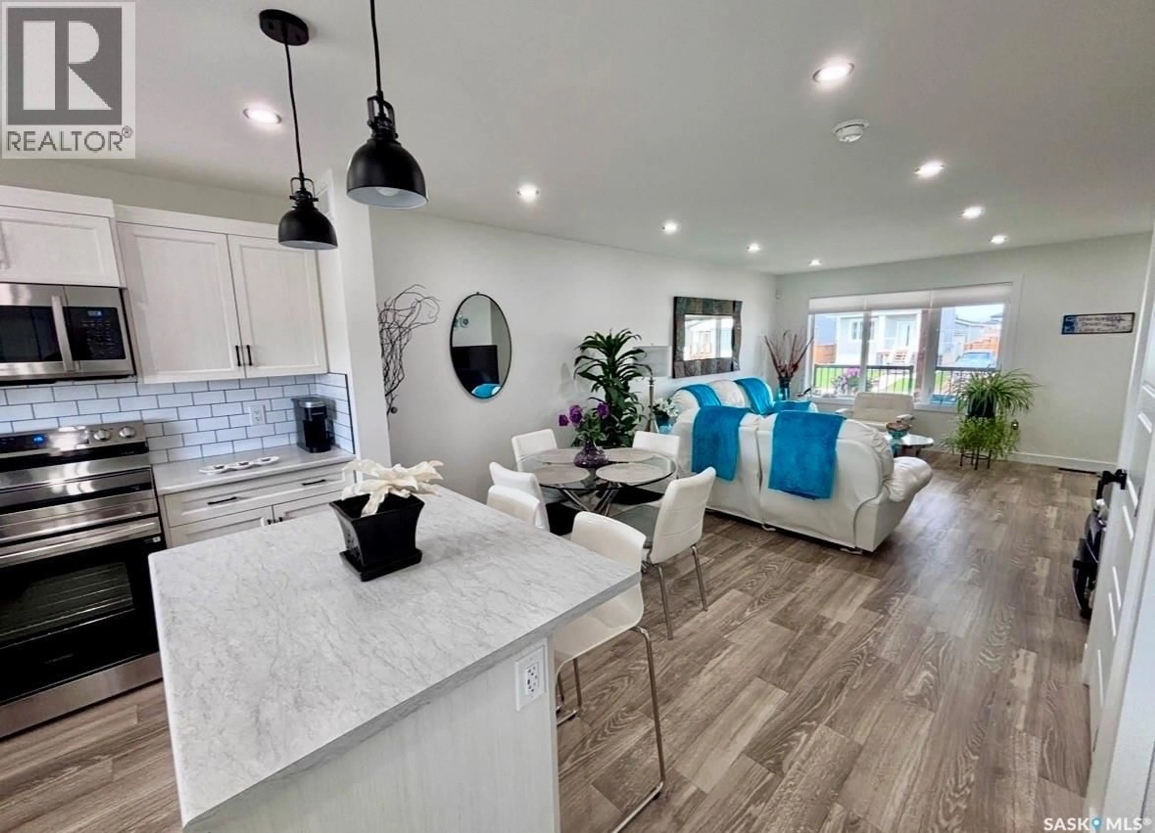 Open concept kitchen, unknown for 415 ELDORADO STREET, Warman Saskatchewan S0K4S0