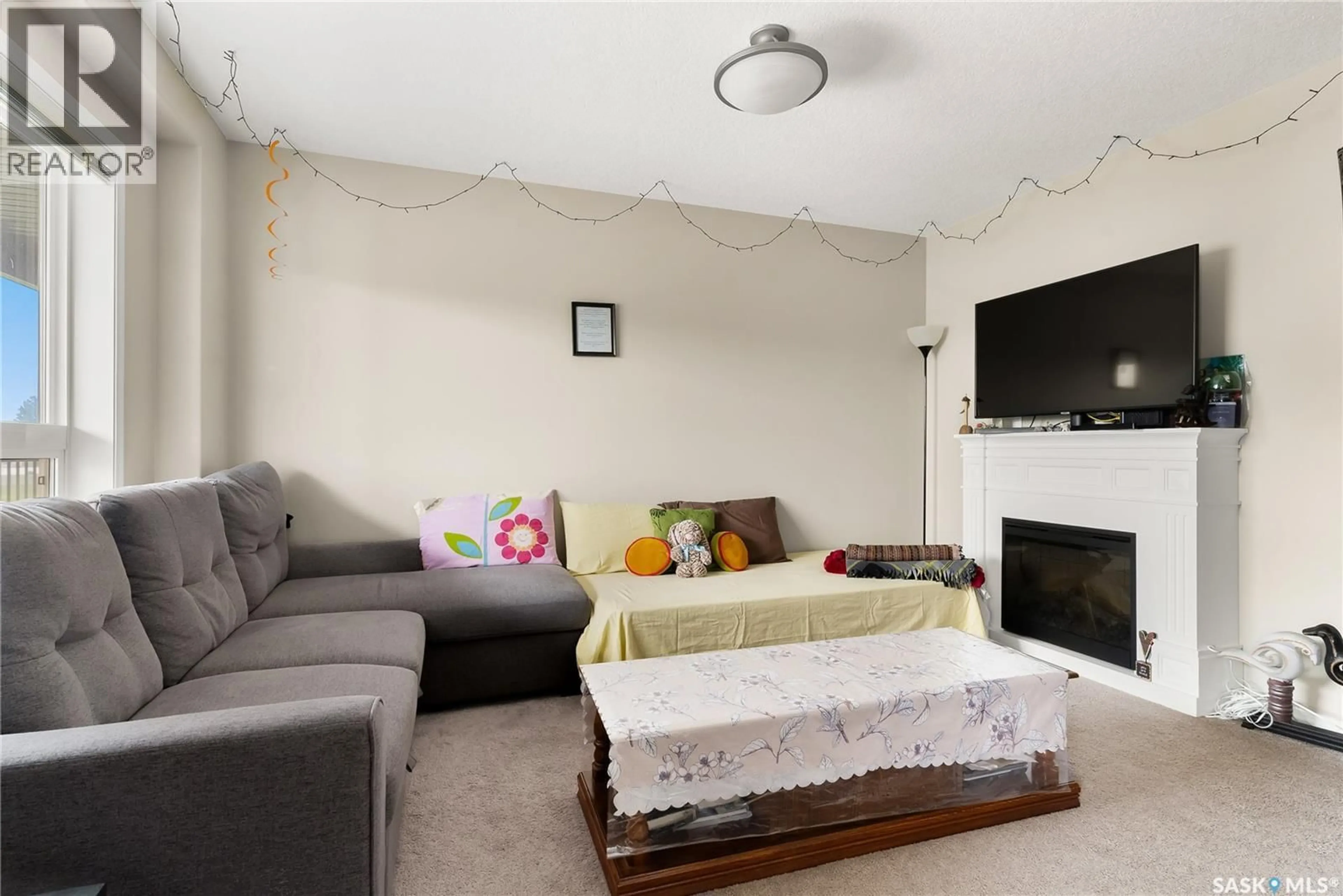 Living room with furniture, unknown for 305 - 3822 DEWDNEY AVENUE, Regina Saskatchewan S4Z0A6