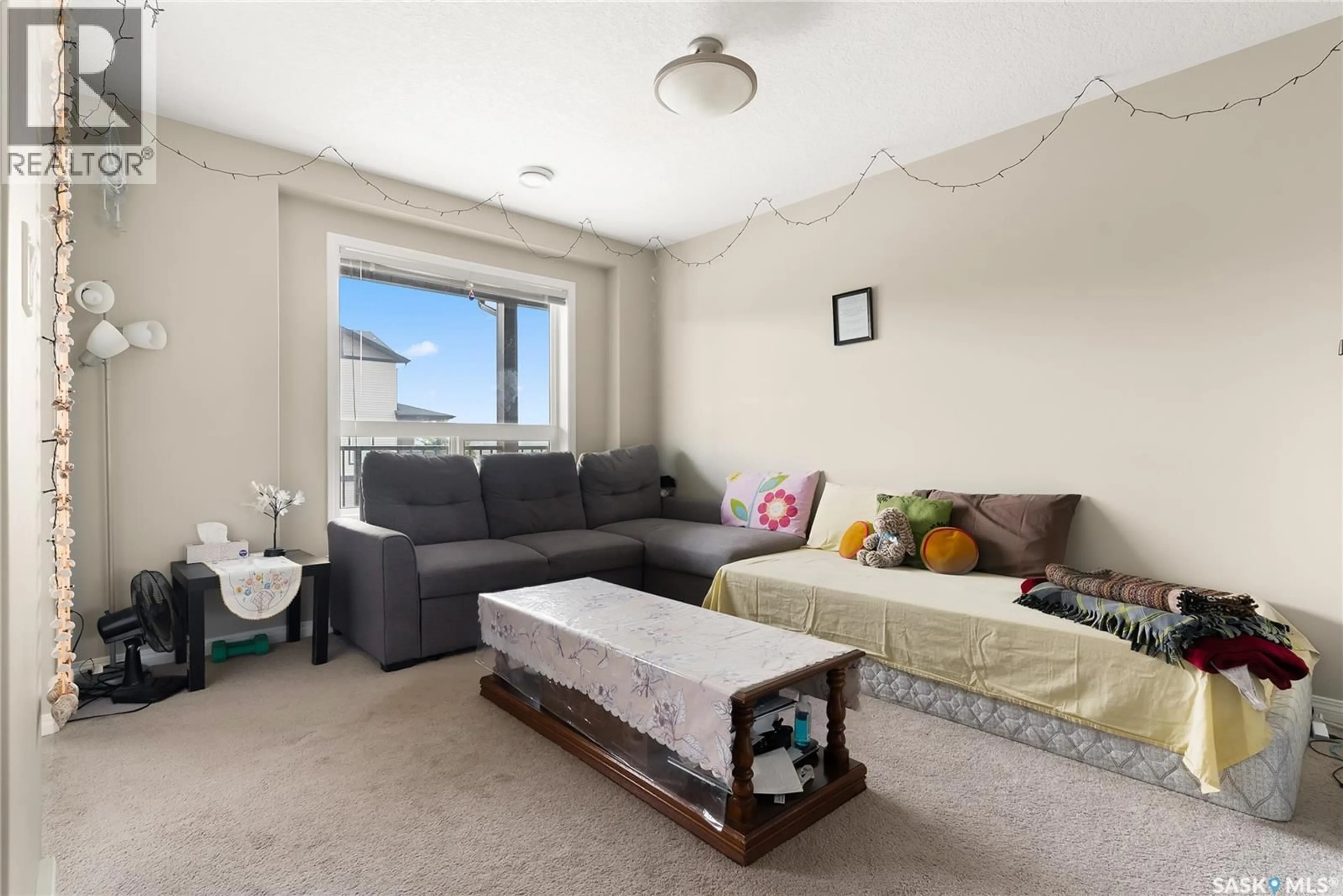 Living room with furniture, unknown for 305 - 3822 DEWDNEY AVENUE, Regina Saskatchewan S4Z0A6
