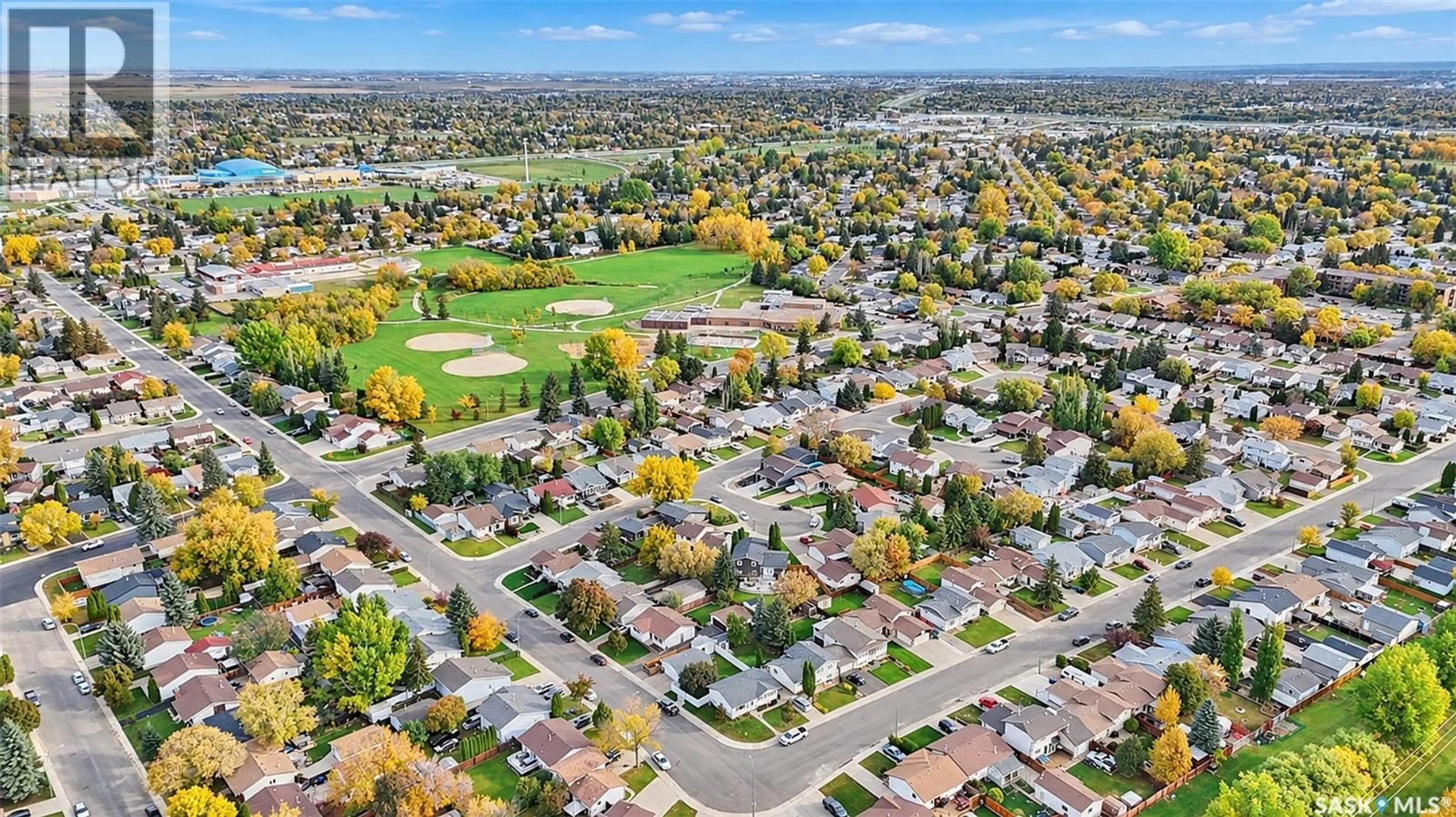 A pic from outside/outdoor area/front of a property/back of a property/a pic from drone, street for 238 SHERRY CRESCENT, Saskatoon Saskatchewan S7M5R5