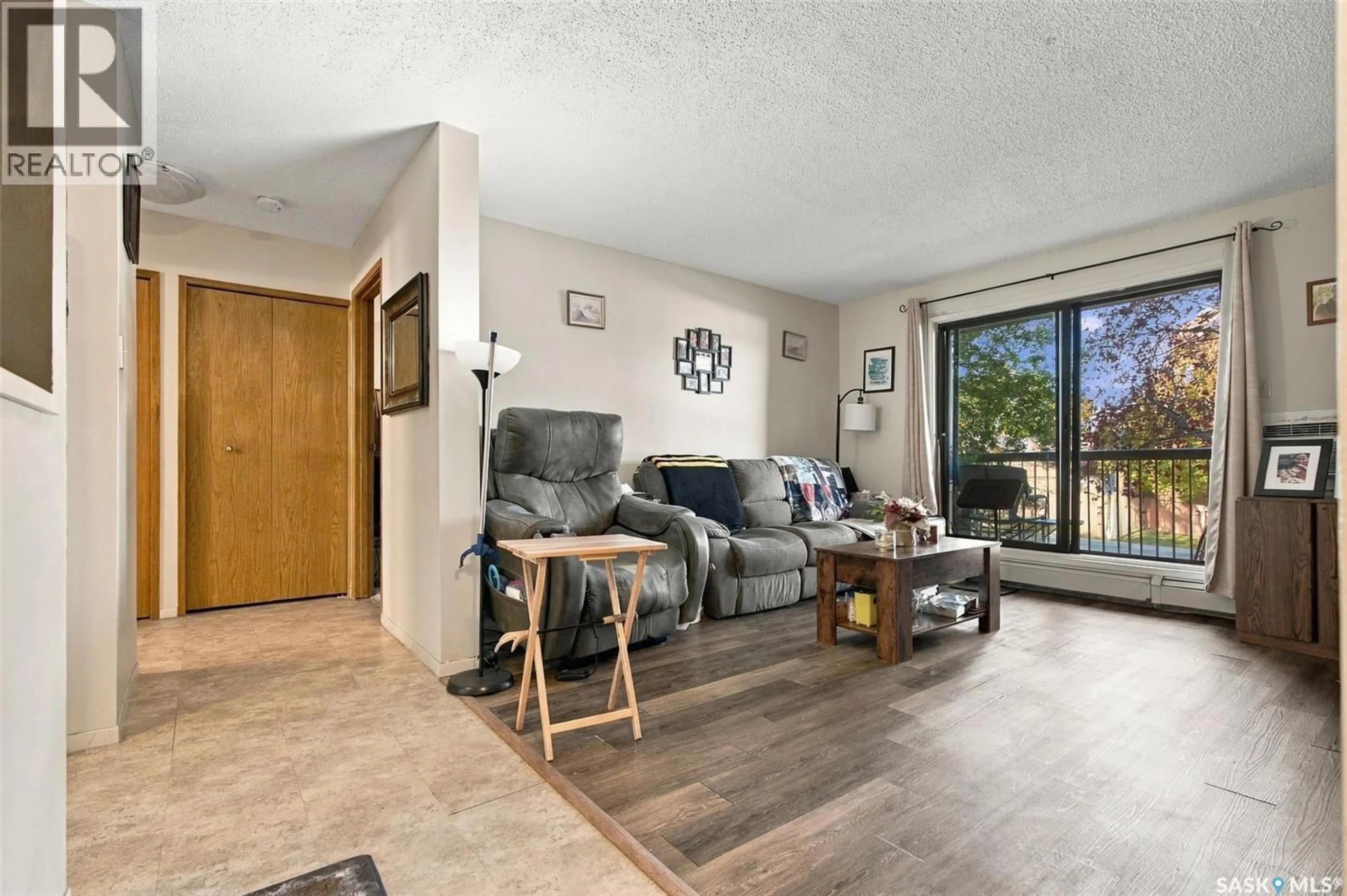 Living room with furniture, unknown for 202 275 KINGSMERE BOULEVARD, Saskatoon Saskatchewan S7J4J6