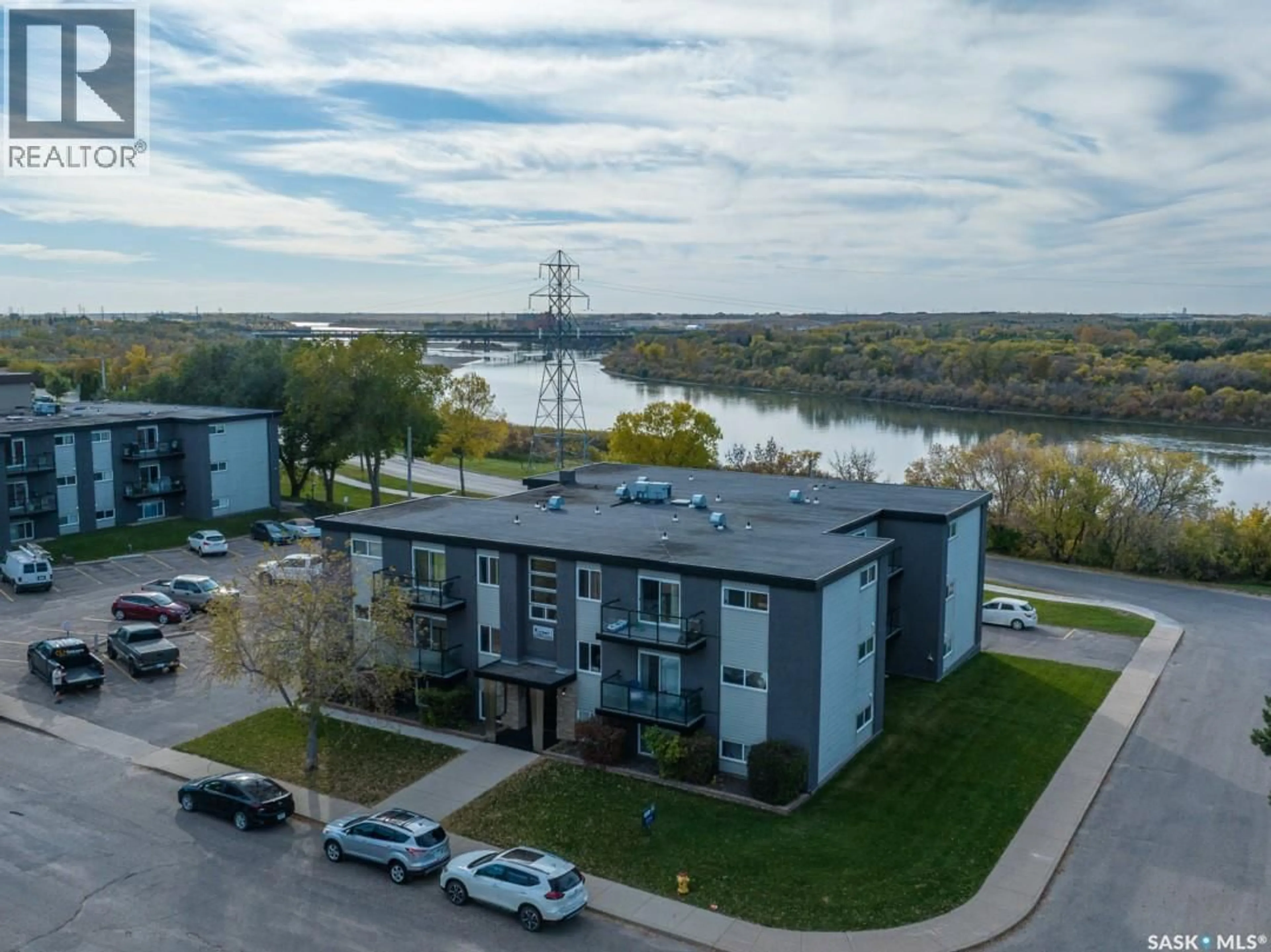 A pic from outside/outdoor area/front of a property/back of a property/a pic from drone, water/lake/river/ocean view for 2106 - 17 STE CECILIA AVENUE, Saskatoon Saskatchewan S7M0P2