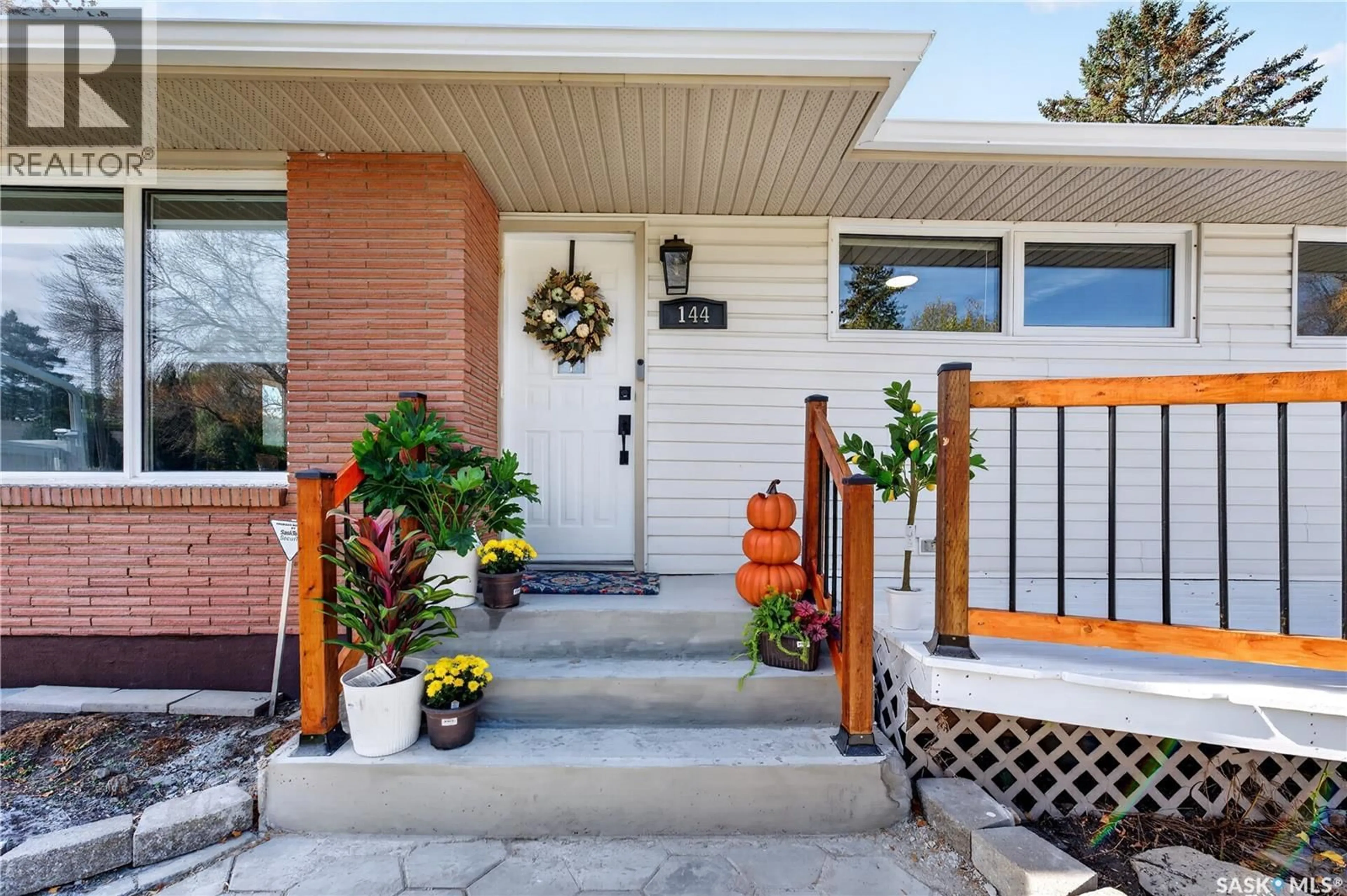 Home with brick exterior material, street for 144 ORCHARD CRESCENT, Regina Saskatchewan S4S5B6