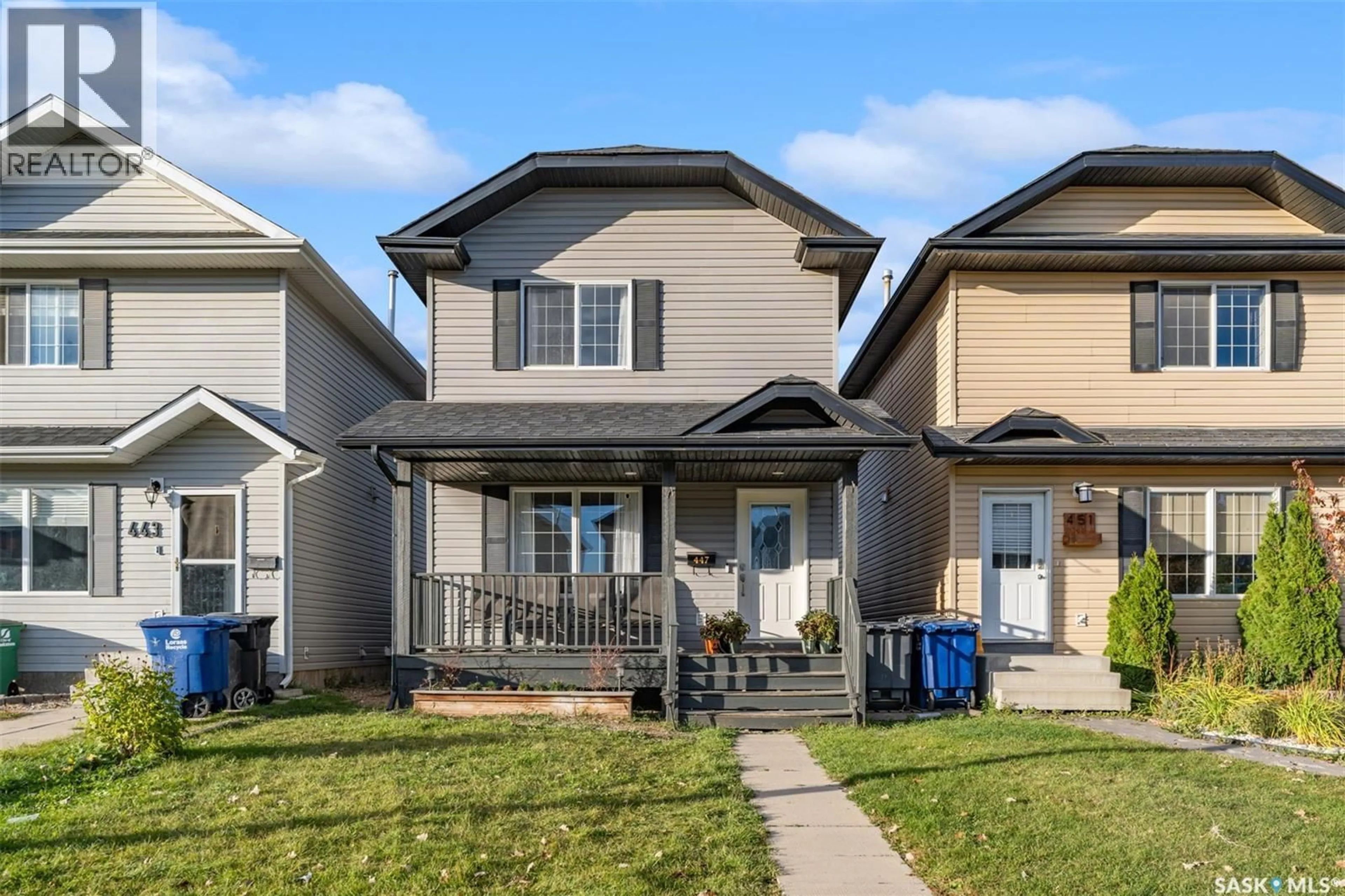 Home with vinyl exterior material, street for 447 BLAKENEY CRESCENT, Saskatoon Saskatchewan S7L7N5