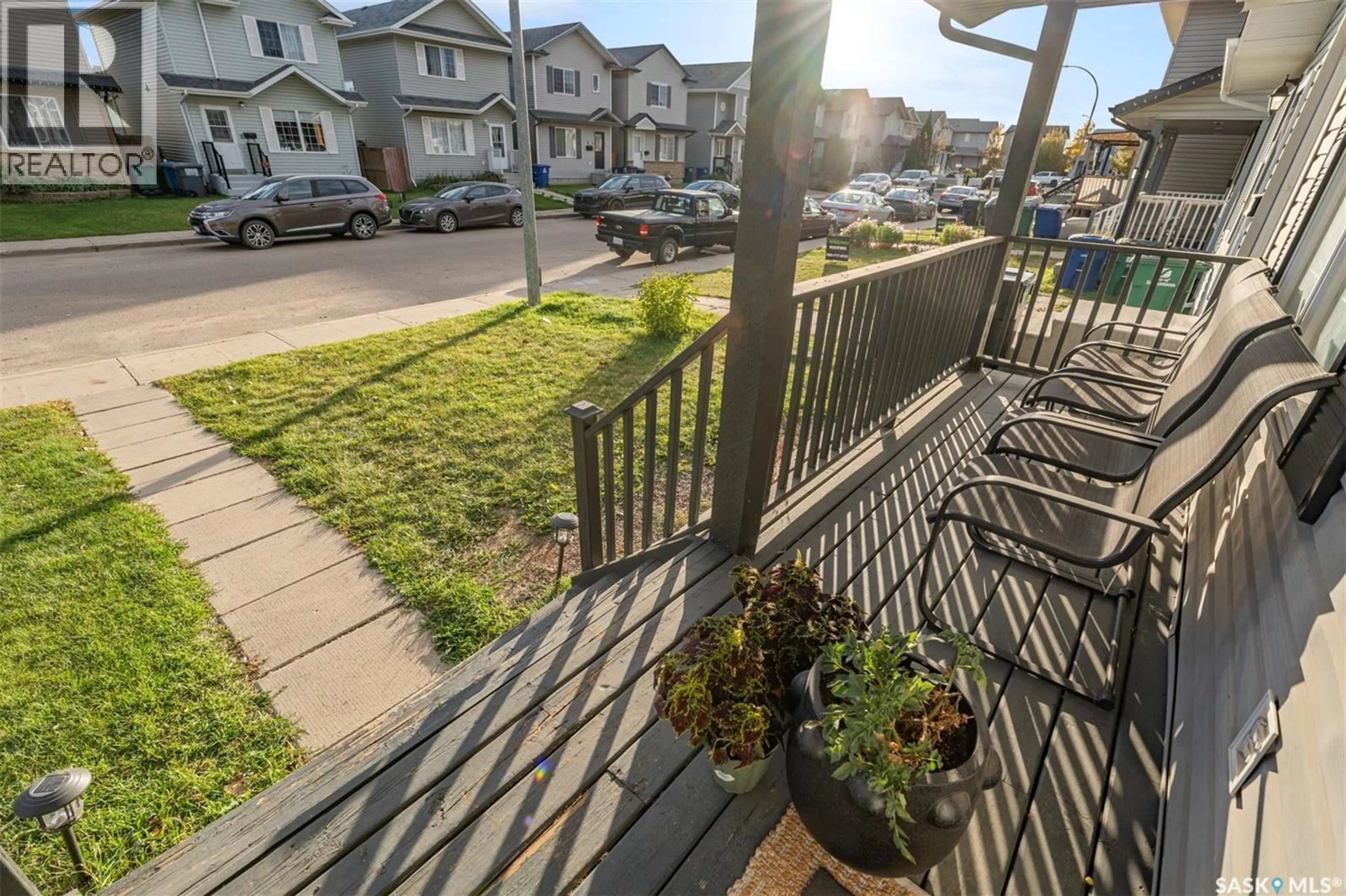 Patio, street for 447 BLAKENEY CRESCENT, Saskatoon Saskatchewan S7L7N5