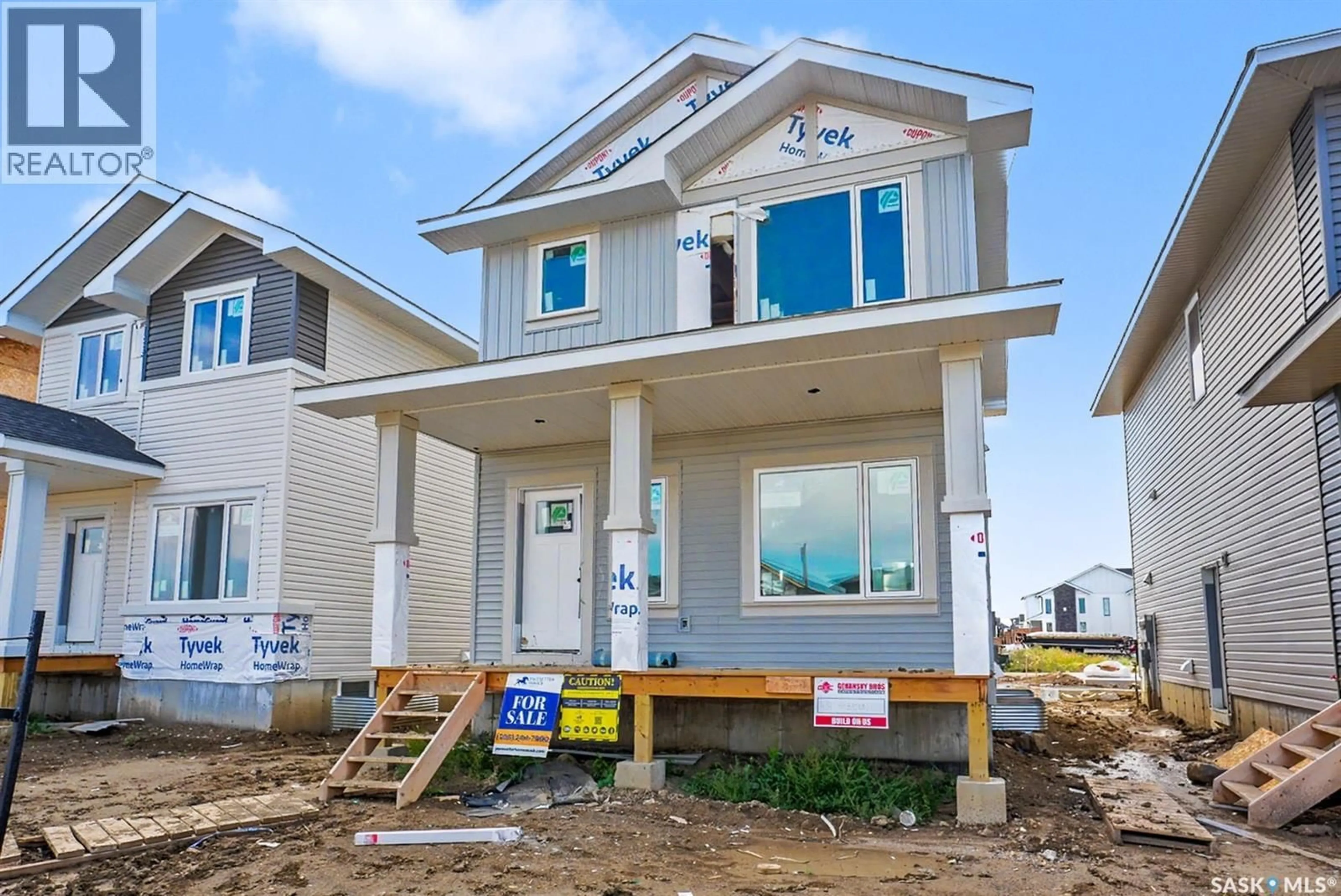 Home with vinyl exterior material, unknown for 414 STEHWIEN STREET, Saskatoon Saskatchewan S7W1M9