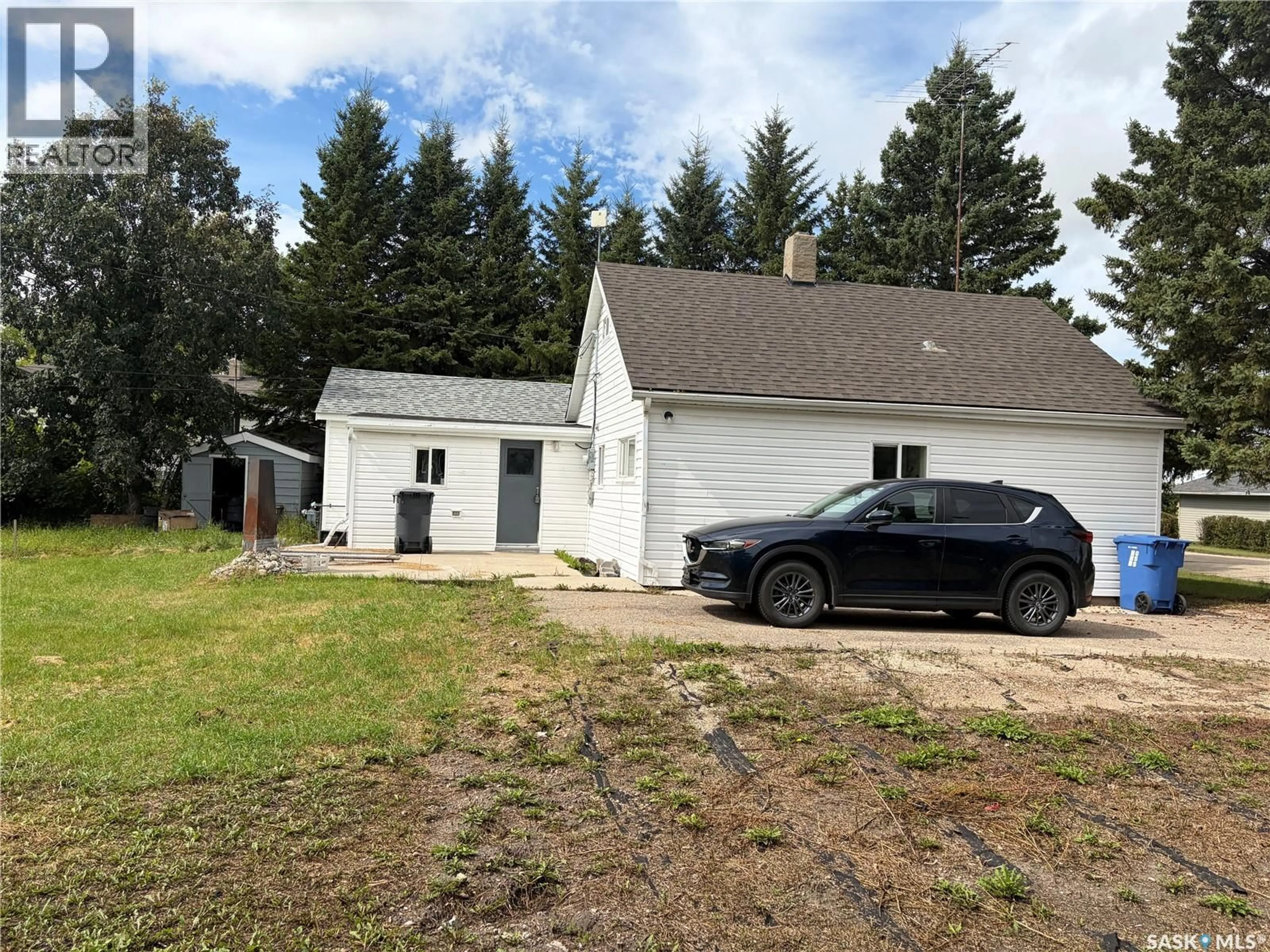 A pic from outside/outdoor area/front of a property/back of a property/a pic from drone, street for 113 3RD AVENUE, Ituna Saskatchewan S0A1N0