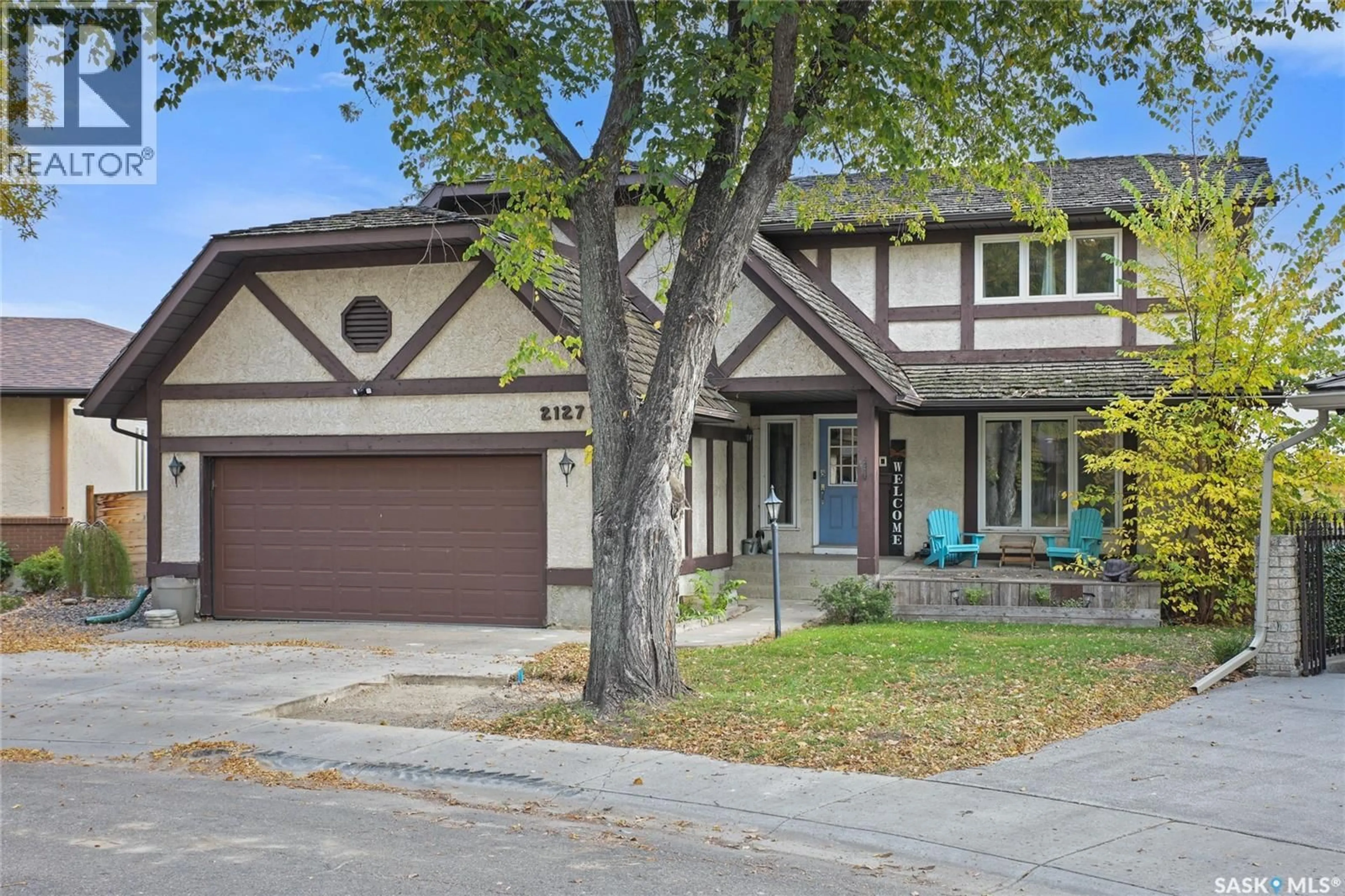 Home with vinyl exterior material, street for 2127 CUNNING CRESCENT, Regina Saskatchewan S4V0M7