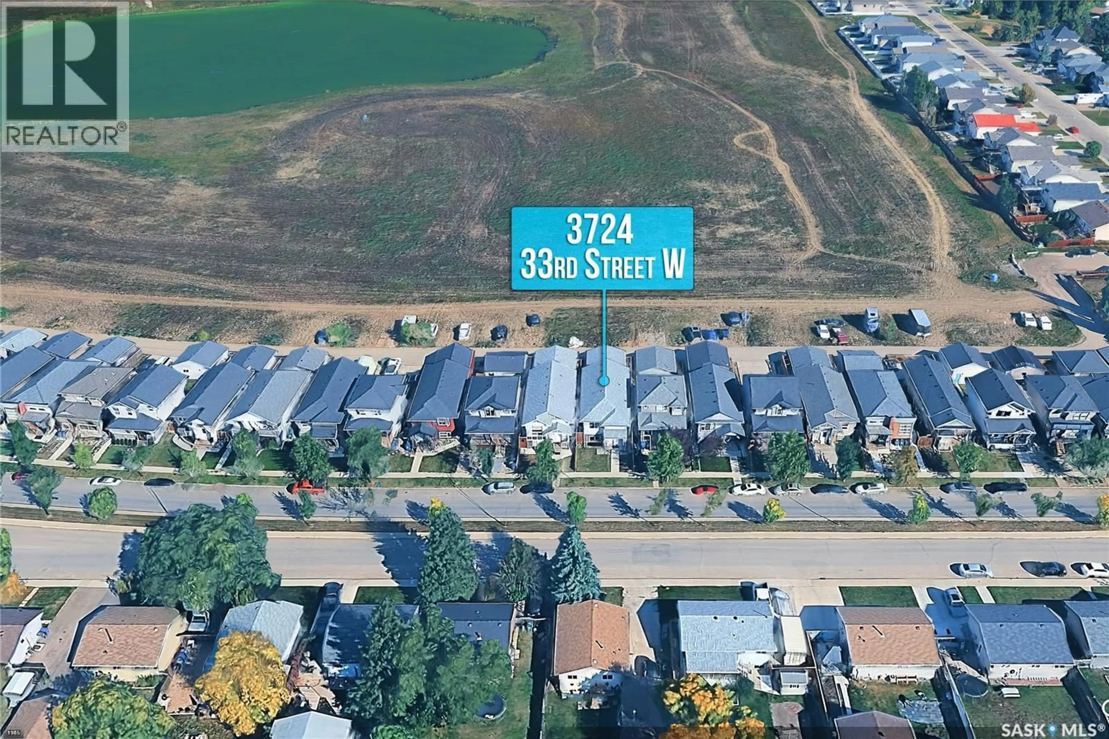 A pic from outside/outdoor area/front of a property/back of a property/a pic from drone, street for 3742 33RD STREET, Saskatoon Saskatchewan S7R0M1