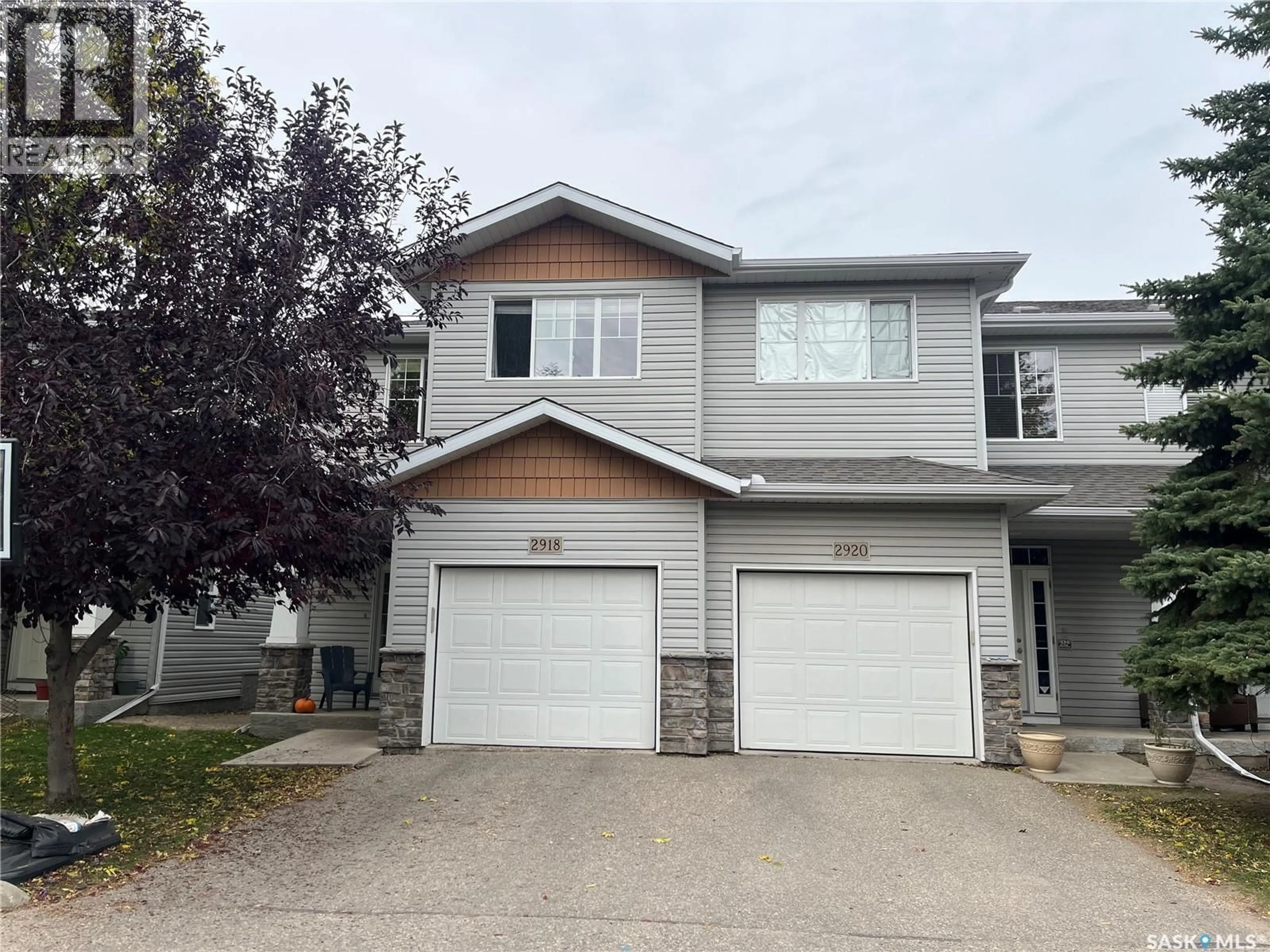 Home with vinyl exterior material, street for 2918 CRANBOURN CRESCENT, Regina Saskatchewan S4V3E4