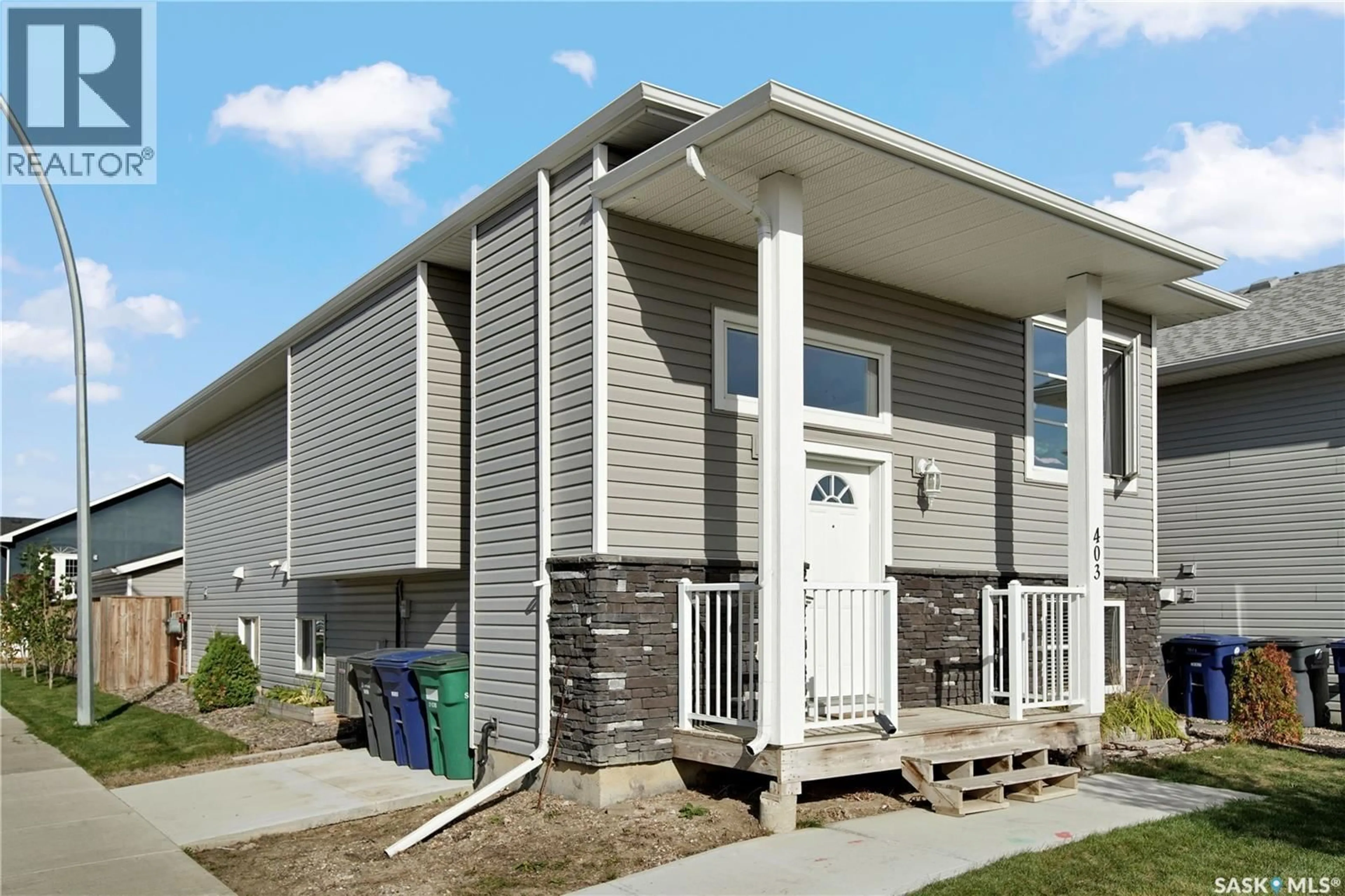 Home with vinyl exterior material, building for 403 BOYKOWICH STREET, Saskatoon Saskatchewan S7W0S5
