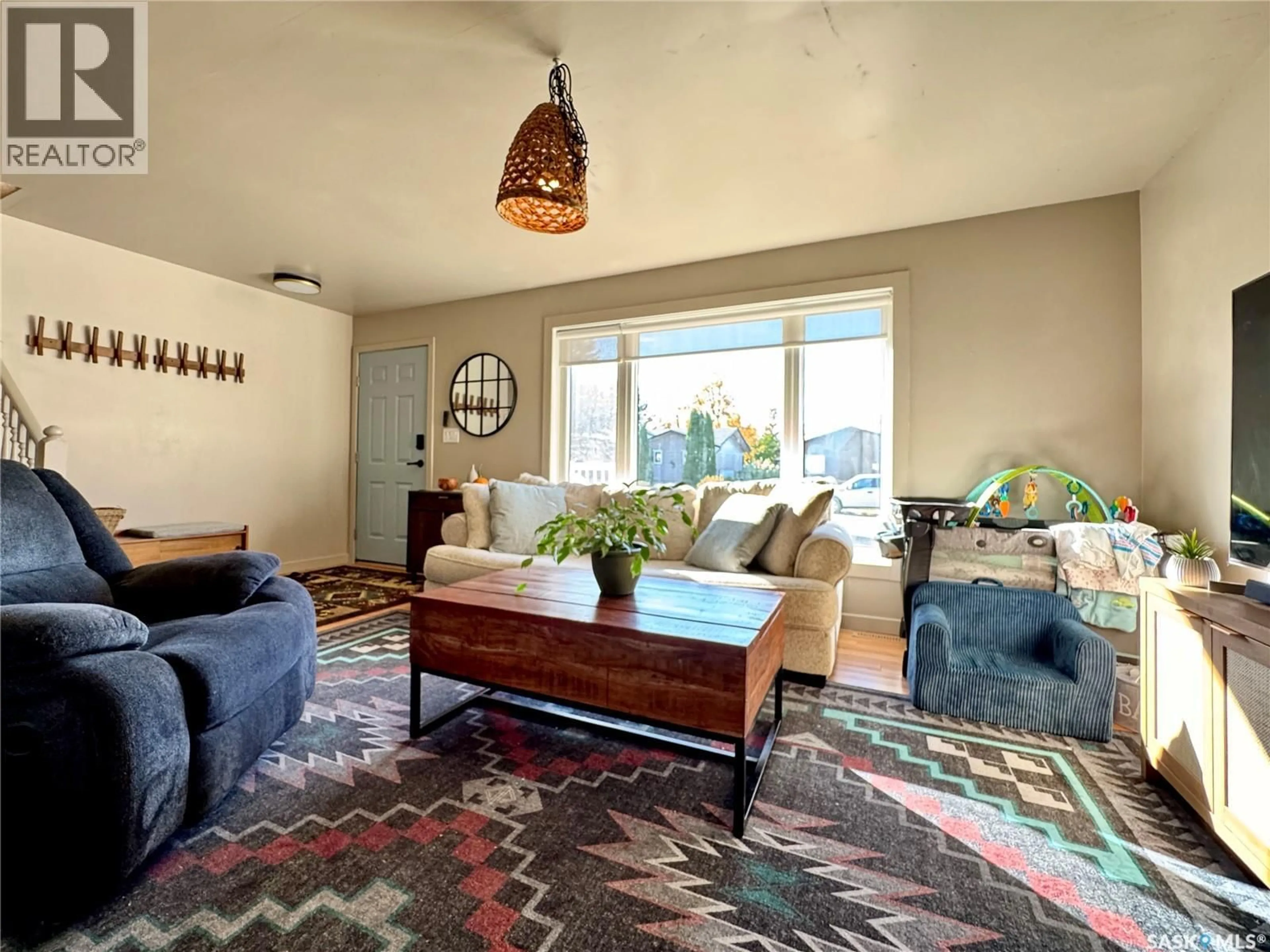 Living room with furniture, carpet floor for 75 LANGRILL DRIVE, Yorkton Saskatchewan S3N3L9