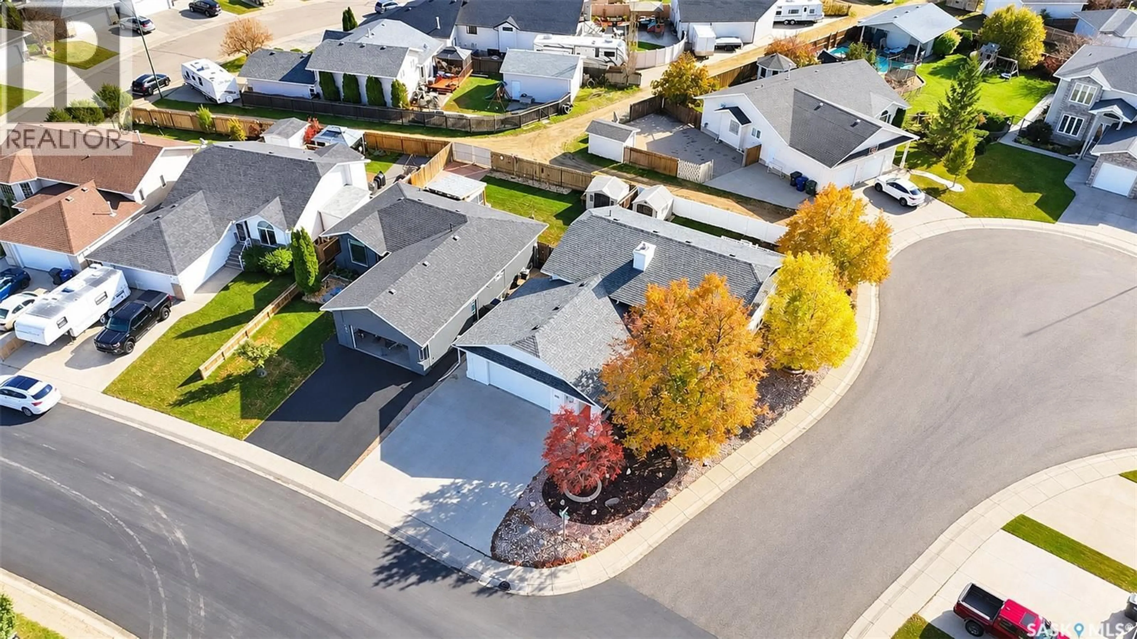 A pic from outside/outdoor area/front of a property/back of a property/a pic from drone, street for 607 4TH STREET, Warman Saskatchewan S0K4S0
