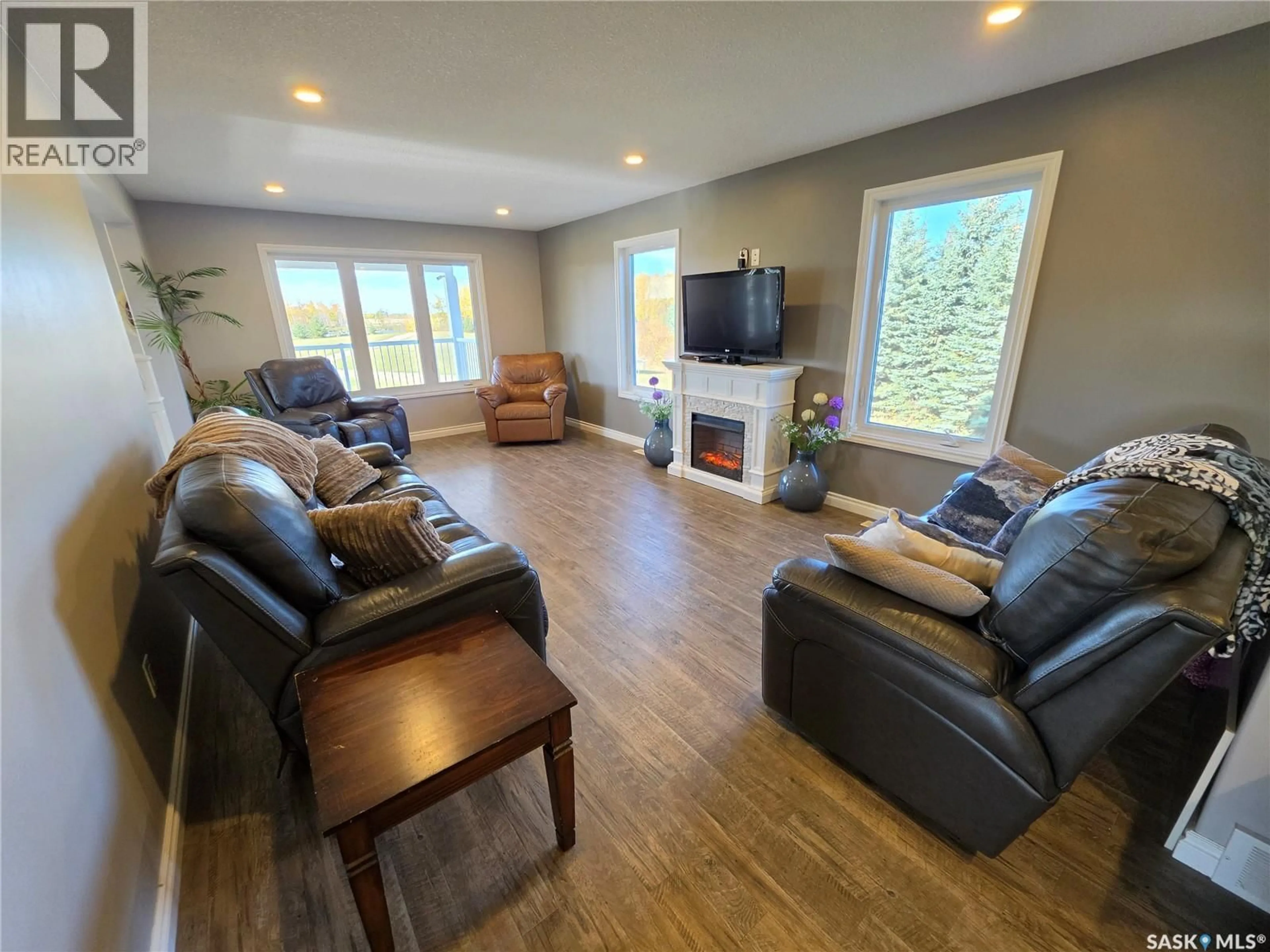 Living room with furniture, wood/laminate floor for 29.66 ACRES WEST OF ML, Meadow Lake Rm No.588 Saskatchewan S9X1Y8