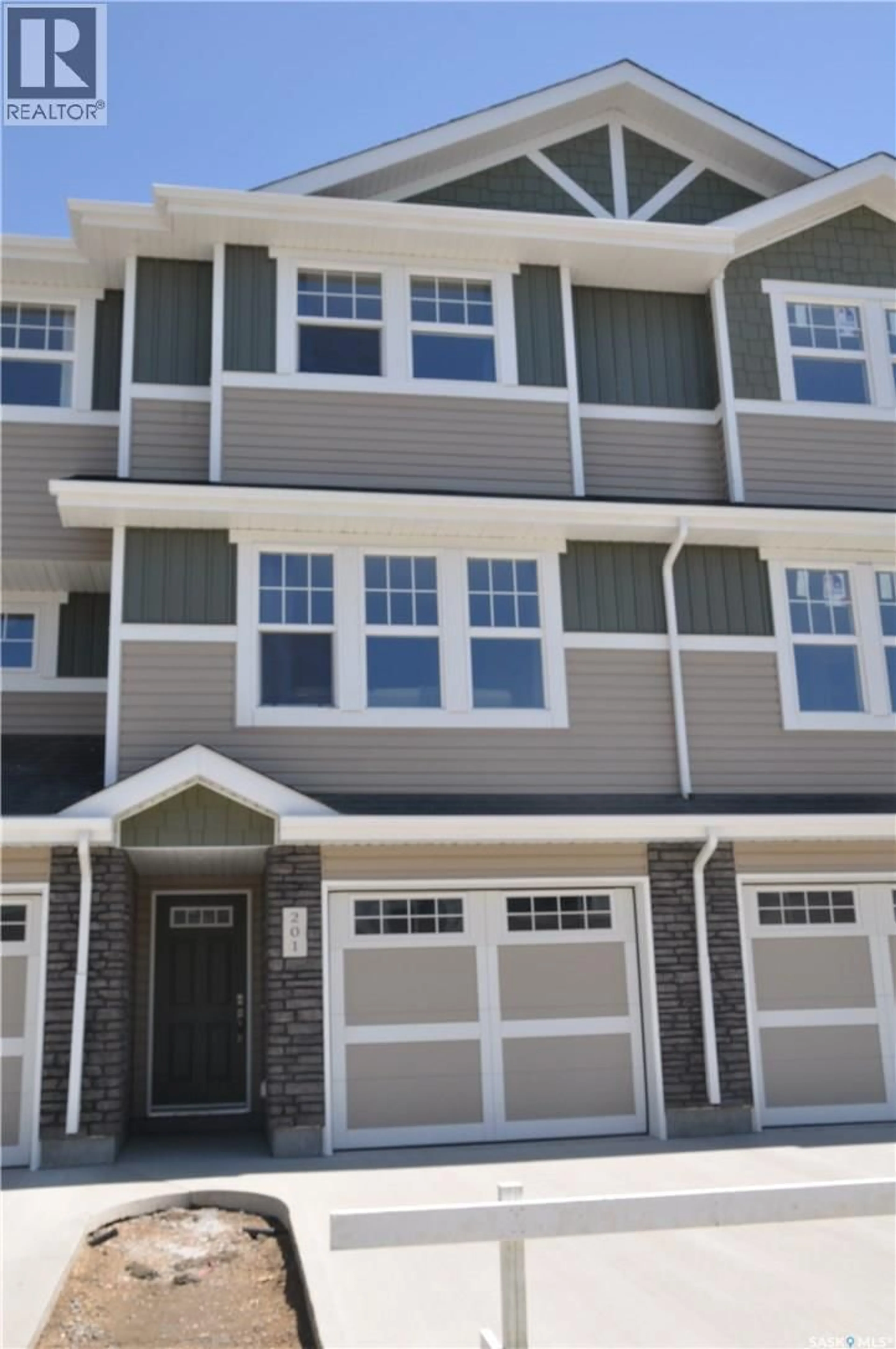 Home with vinyl exterior material, street for 227 1220 PRINGLE WAY, Saskatoon Saskatchewan S7T0V4
