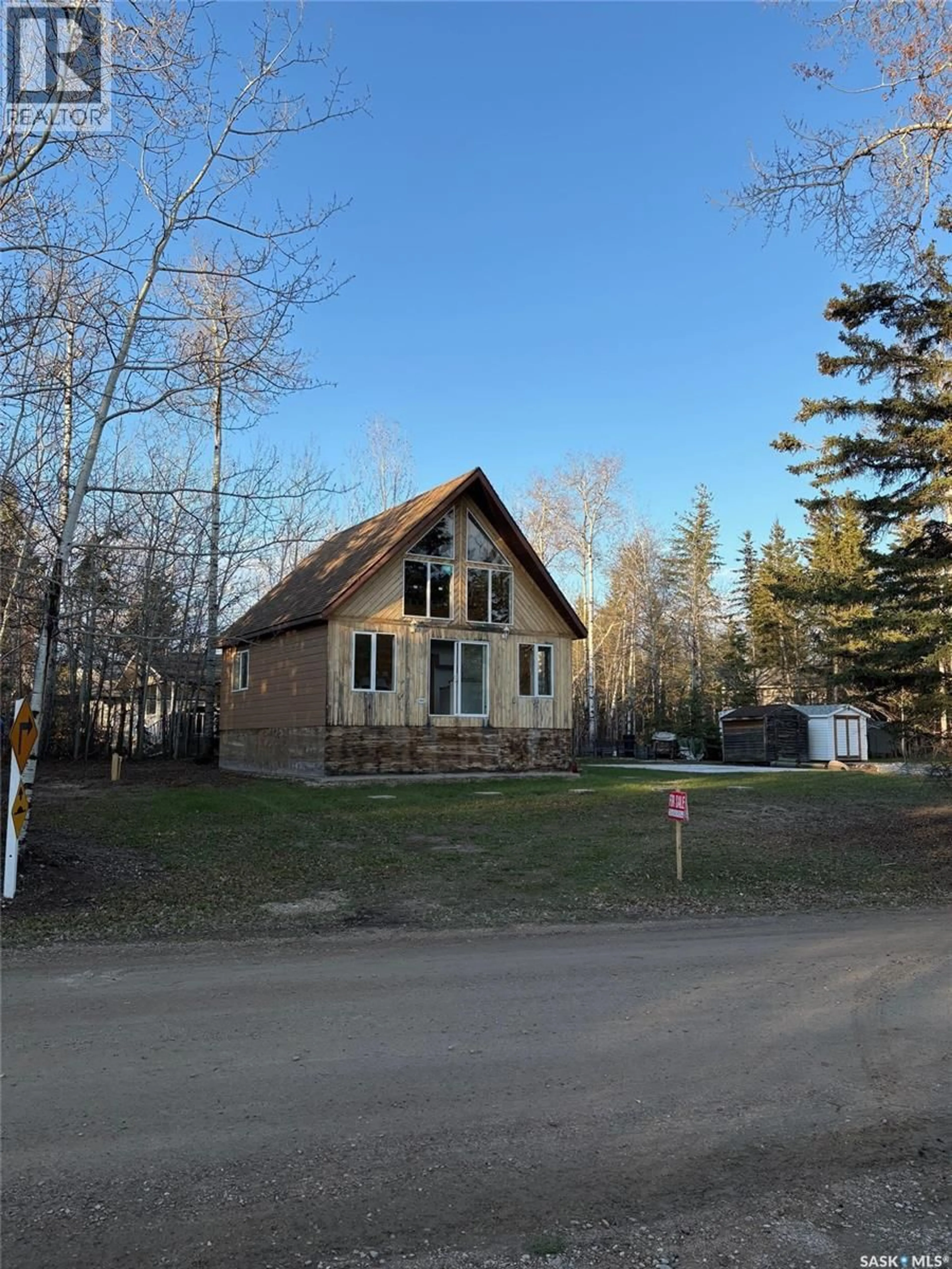 A pic from outside/outdoor area/front of a property/back of a property/a pic from drone, street for 1101 BIRCH DRIVE, Turtle View Saskatchewan S0M1J0