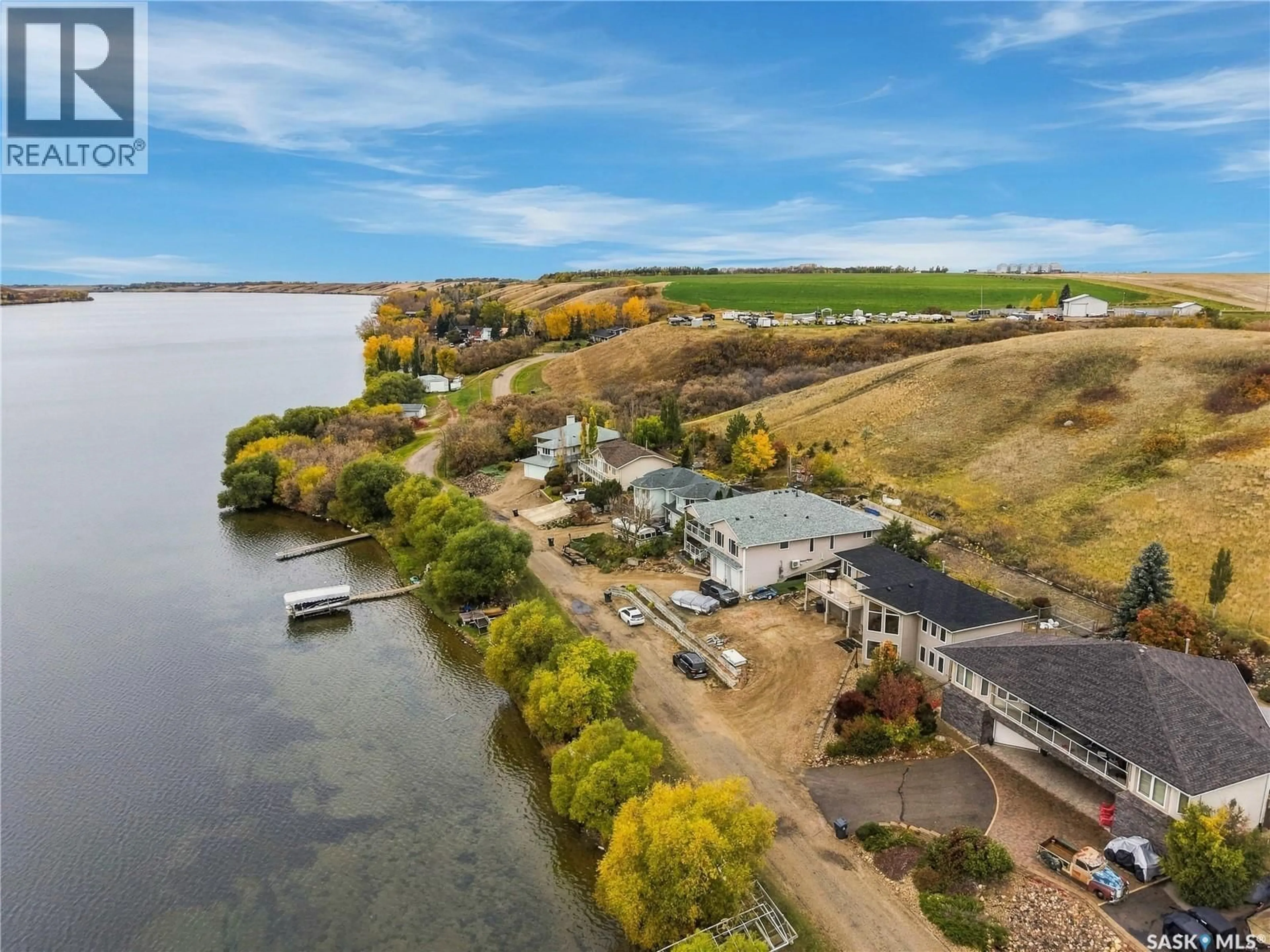 A pic from outside/outdoor area/front of a property/back of a property/a pic from drone, water/lake/river/ocean view for 9 PELICAN PASS, Thode Saskatchewan S7C0A4