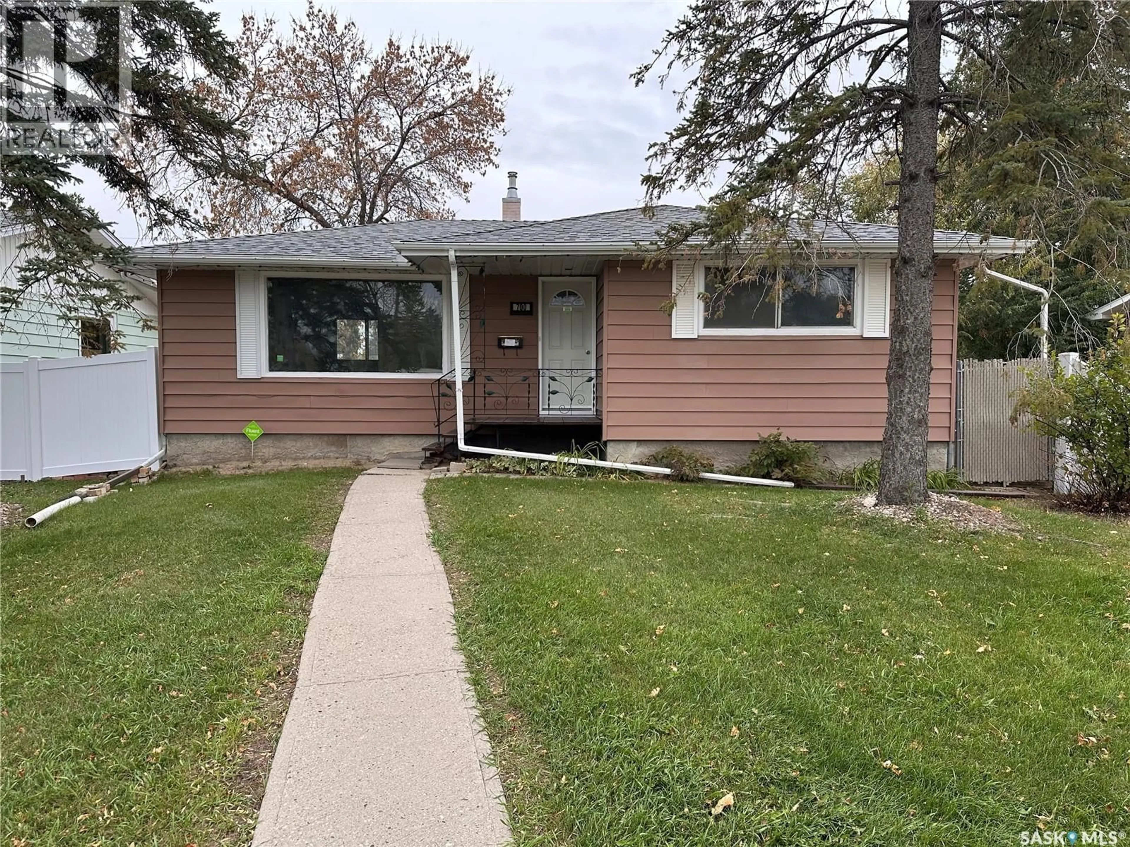 Home with vinyl exterior material, street for 700 FORGET STREET, Regina Saskatchewan S4T4X2