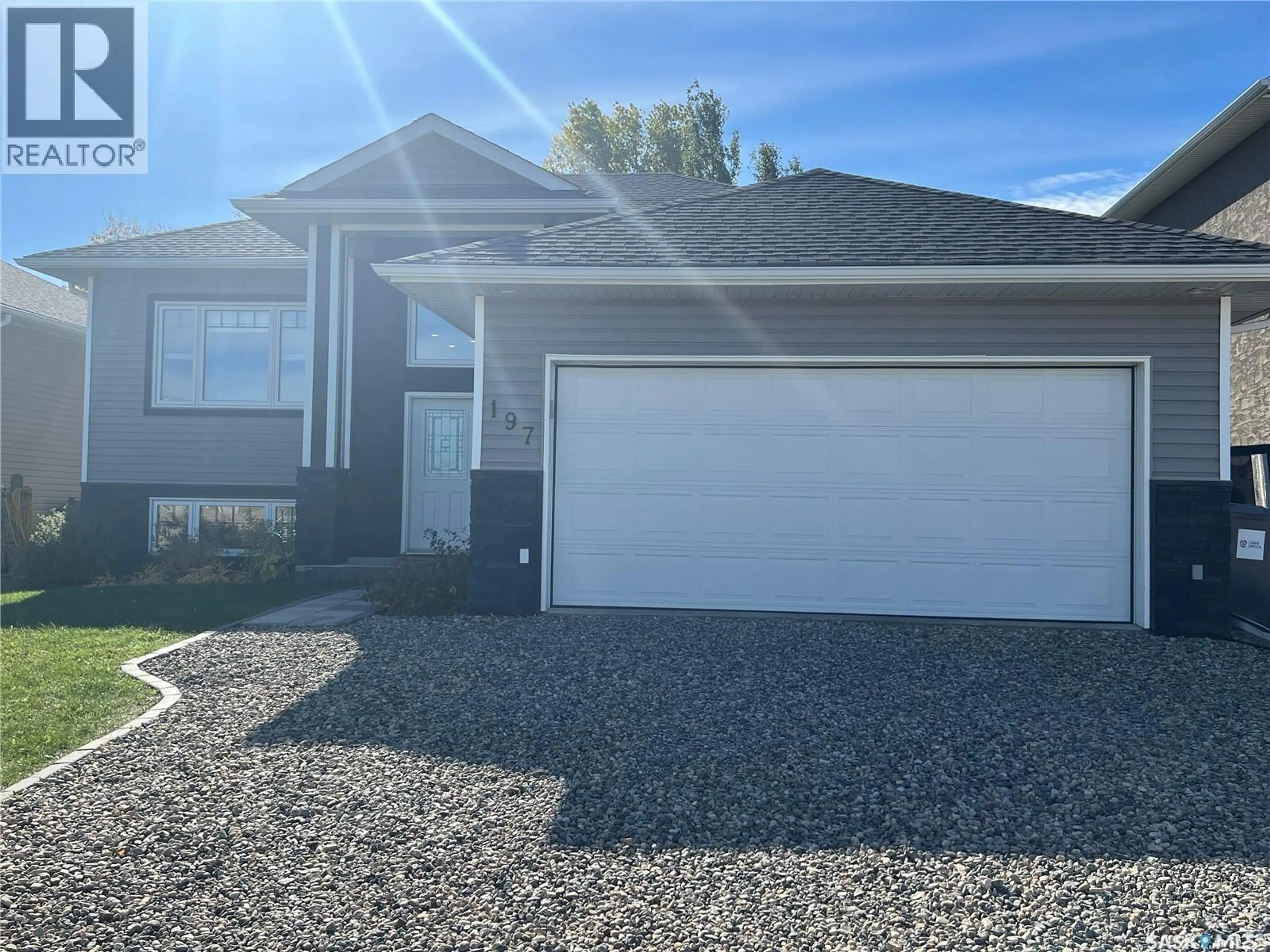 Home with vinyl exterior material, street for 197 5TH AVENUE, Esterhazy Saskatchewan S0A0X0