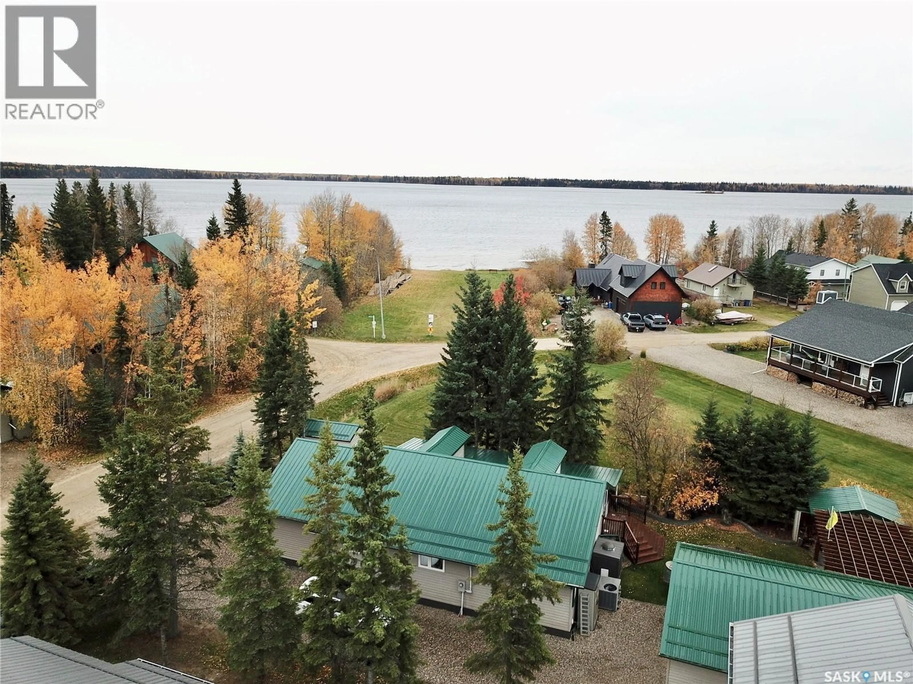 A pic from outside/outdoor area/front of a property/back of a property/a pic from drone, water/lake/river/ocean view for 141 NORTH SHORE ROAD, Chitek Lake Saskatchewan S0J0L0
