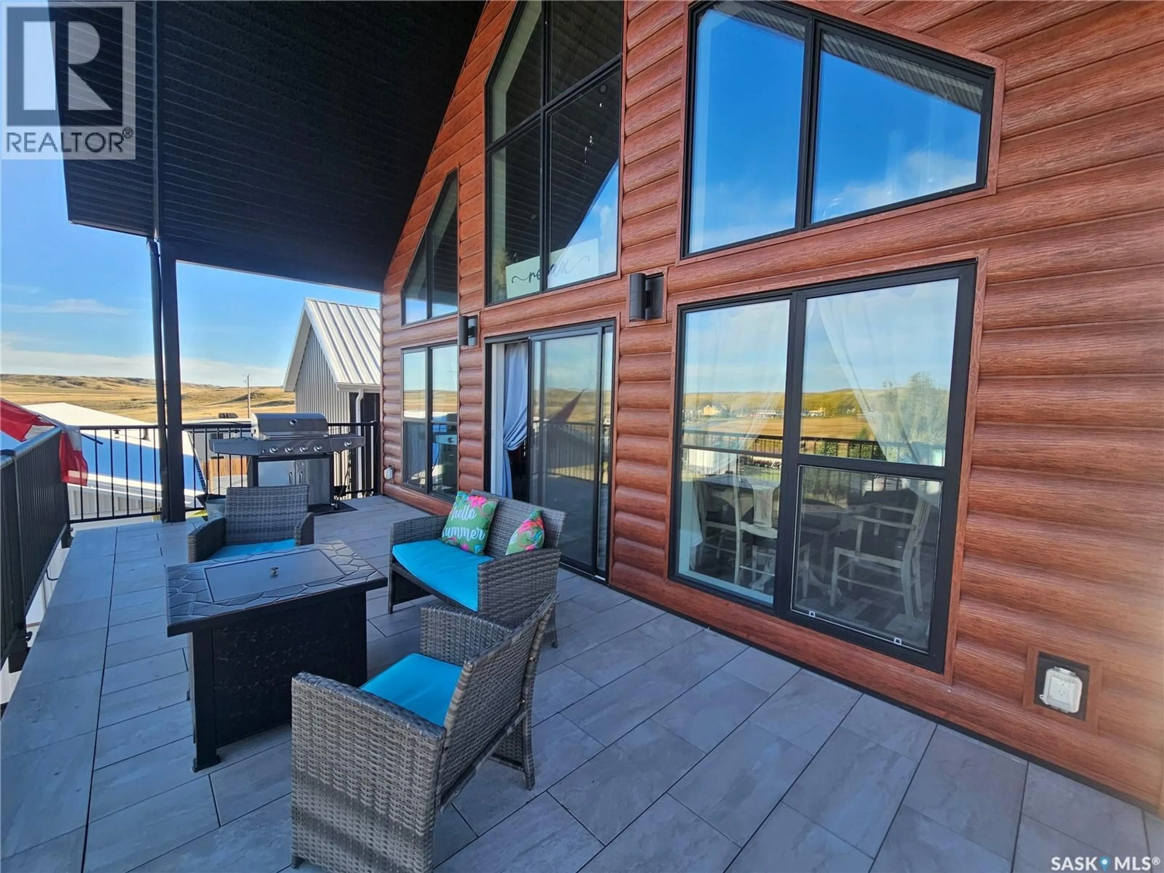 Patio, water/lake/river/ocean view for 203 HILLCREST PLACE, Lac Pelletier Rm No. 107 Saskatchewan S0N2Y0