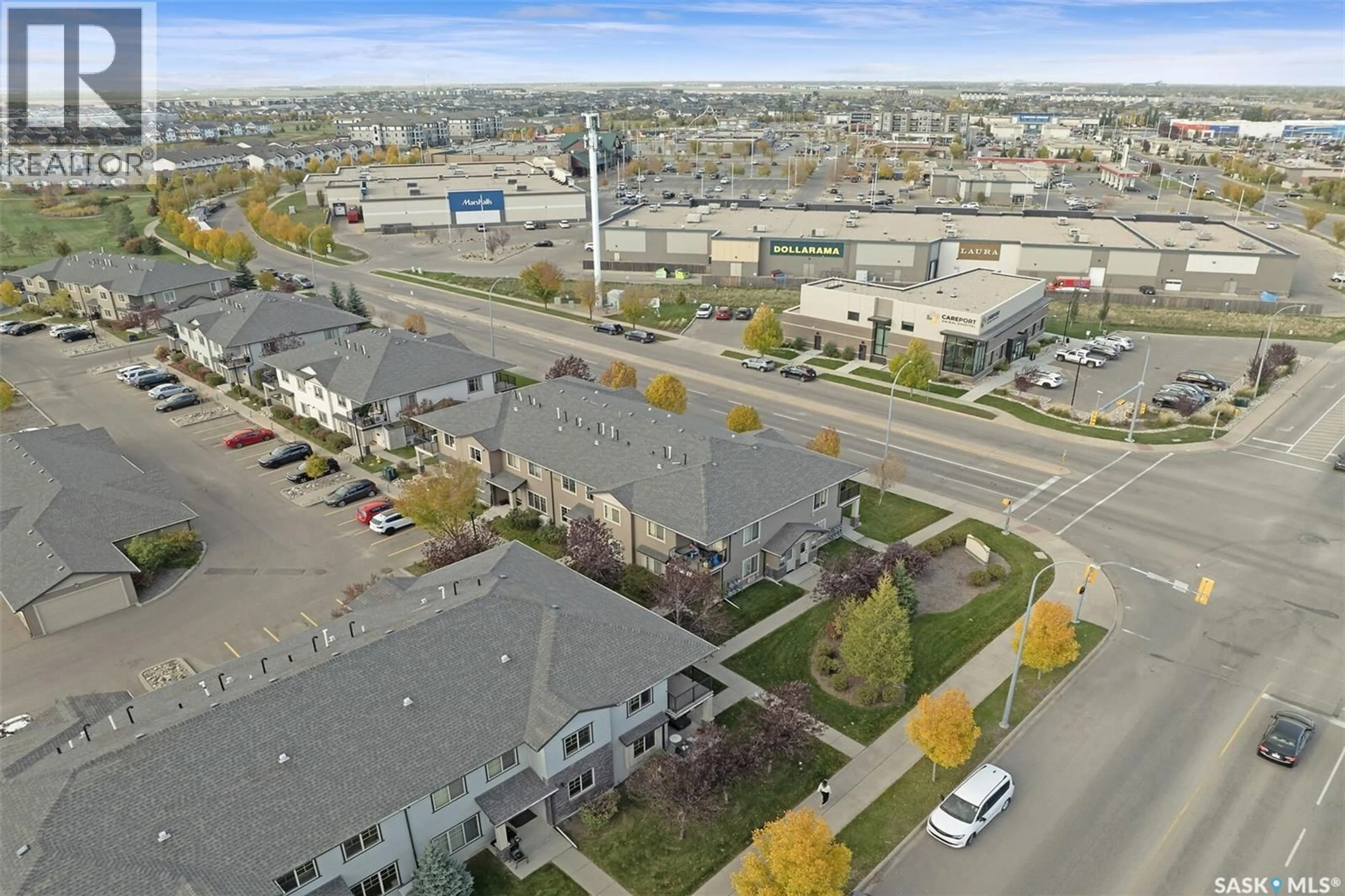 A pic from outside/outdoor area/front of a property/back of a property/a pic from drone, street for 32 5019 JAMES HILL ROAD, Regina Saskatchewan S4W0B9