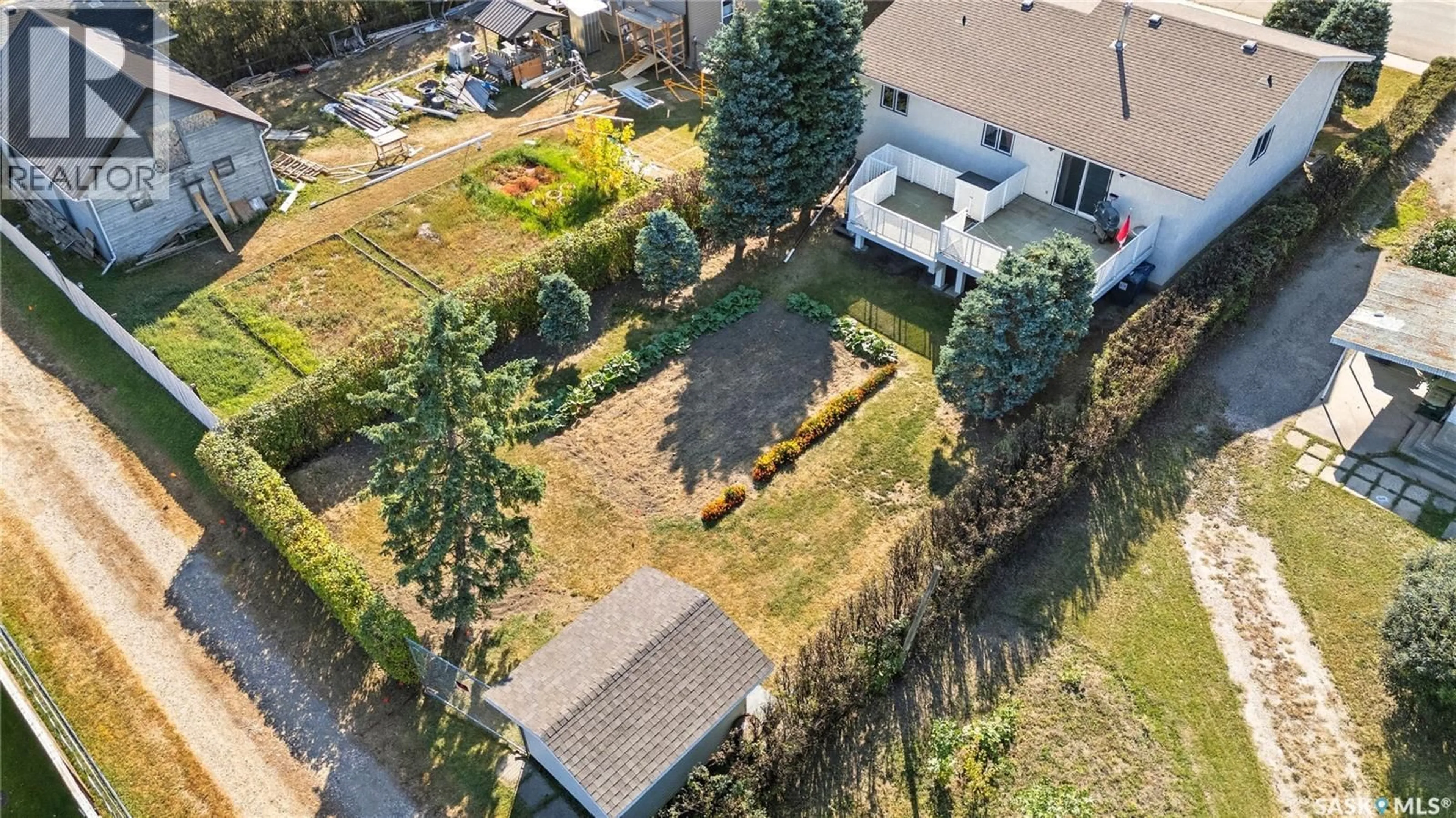 A pic from outside/outdoor area/front of a property/back of a property/a pic from drone, street for 109 1ST AVENUE, Gravelbourg Saskatchewan S0H1X0