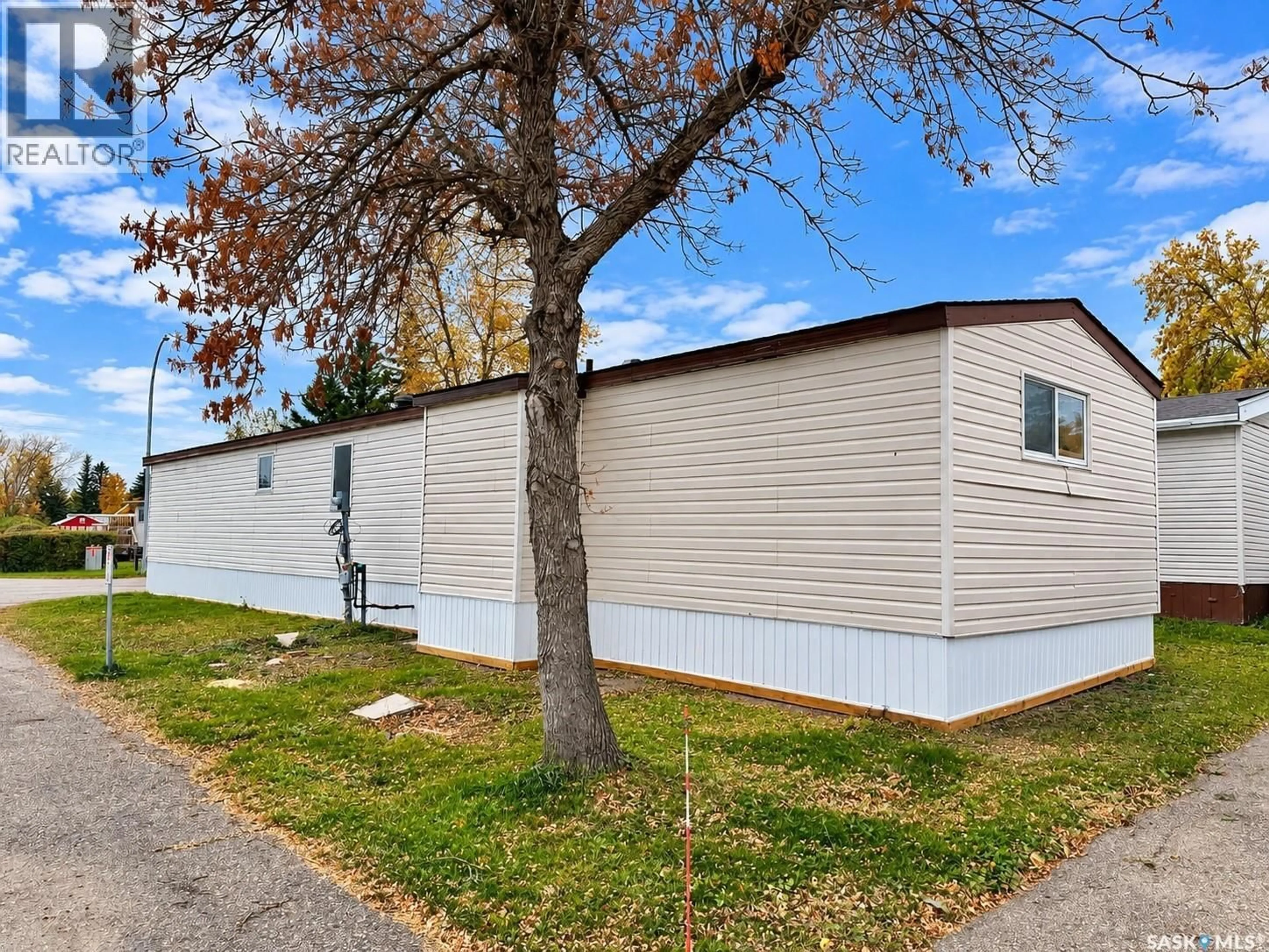 Home with vinyl exterior material, street for 1035 - 34 BOYCHUK DRIVE, Saskatoon Saskatchewan S7H5B2