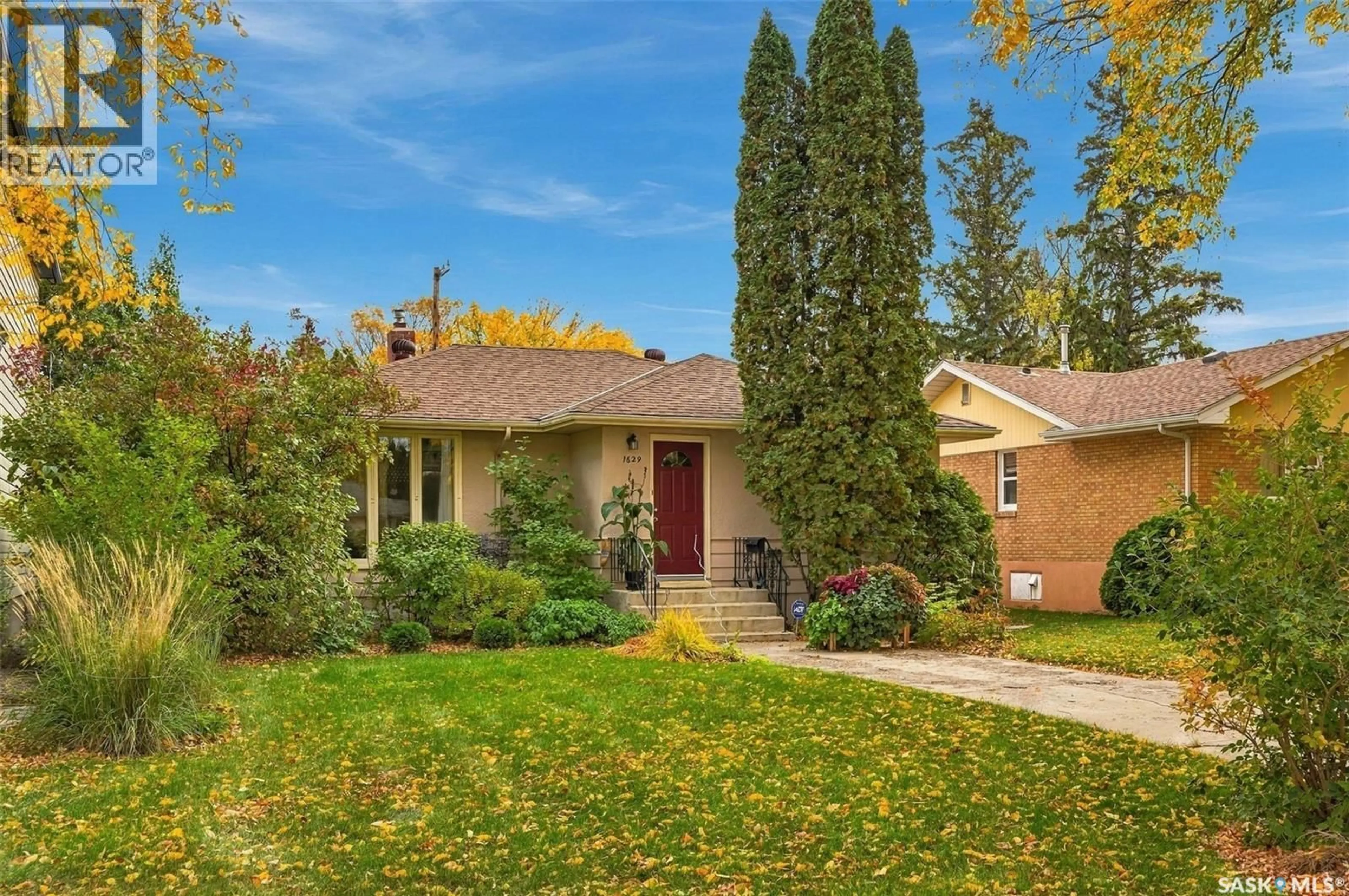Home with brick exterior material, street for 1629 CAIRNS AVENUE, Saskatoon Saskatchewan S7H2H7