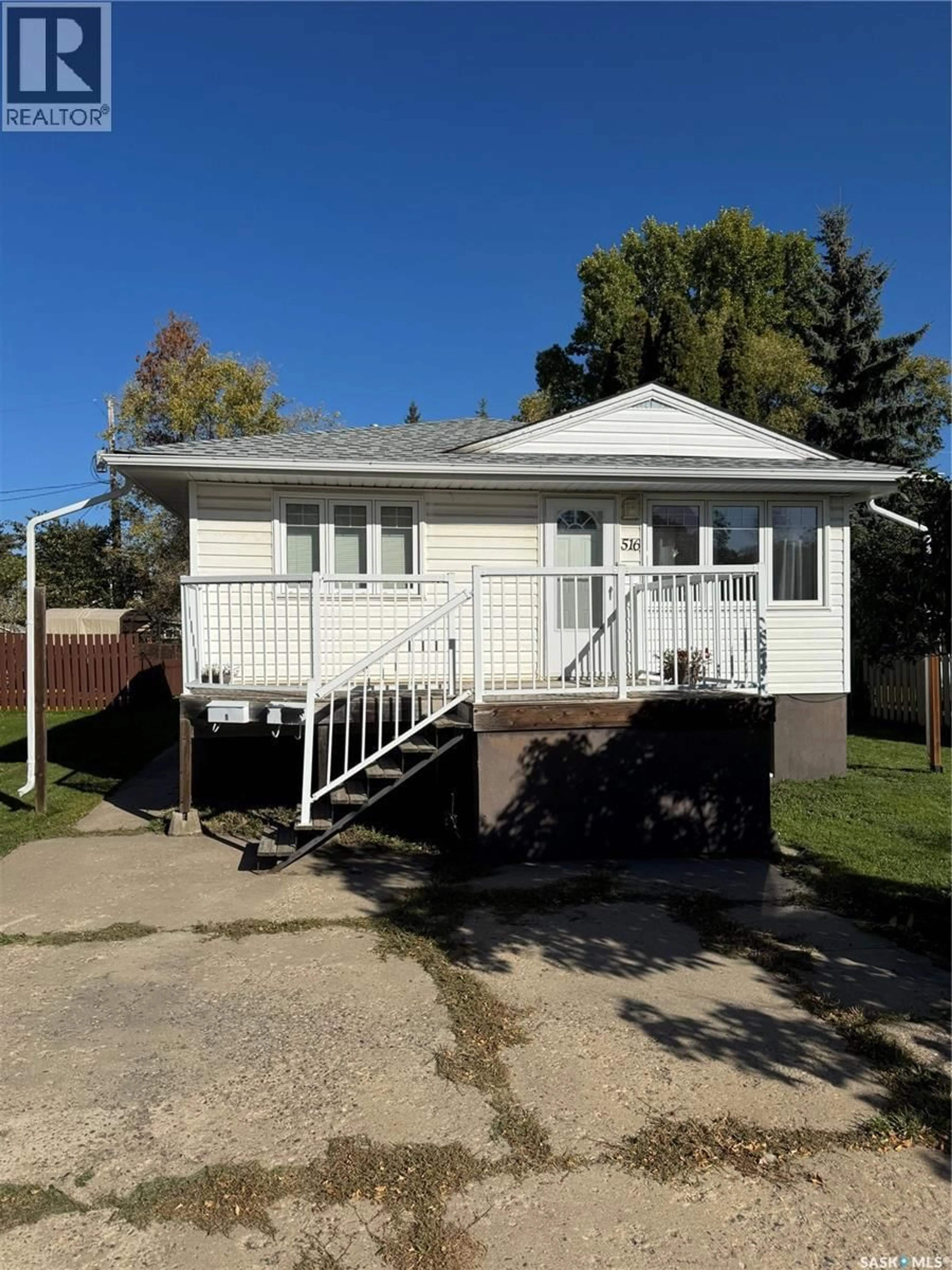 Home with vinyl exterior material, street for 516 26TH STREET, Prince Albert Saskatchewan S6V1V5