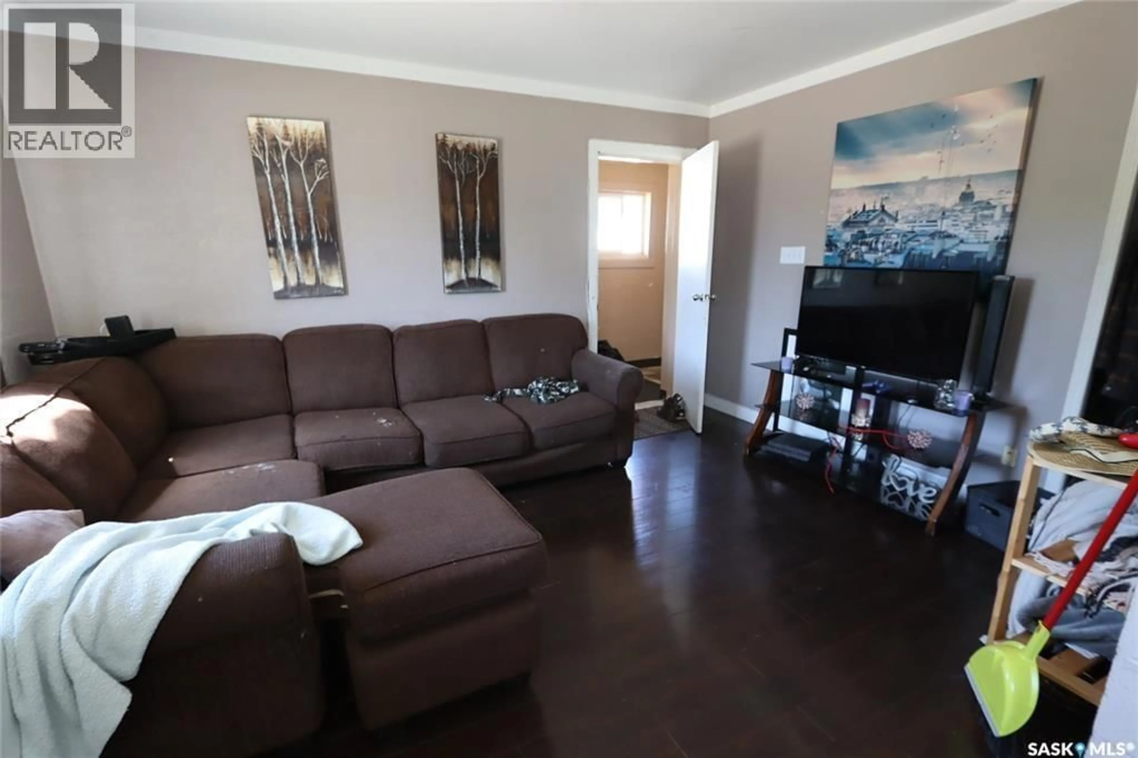 Living room with furniture, wood/laminate floor for 120 26TH STREET, Prince Albert Saskatchewan S6V4P9