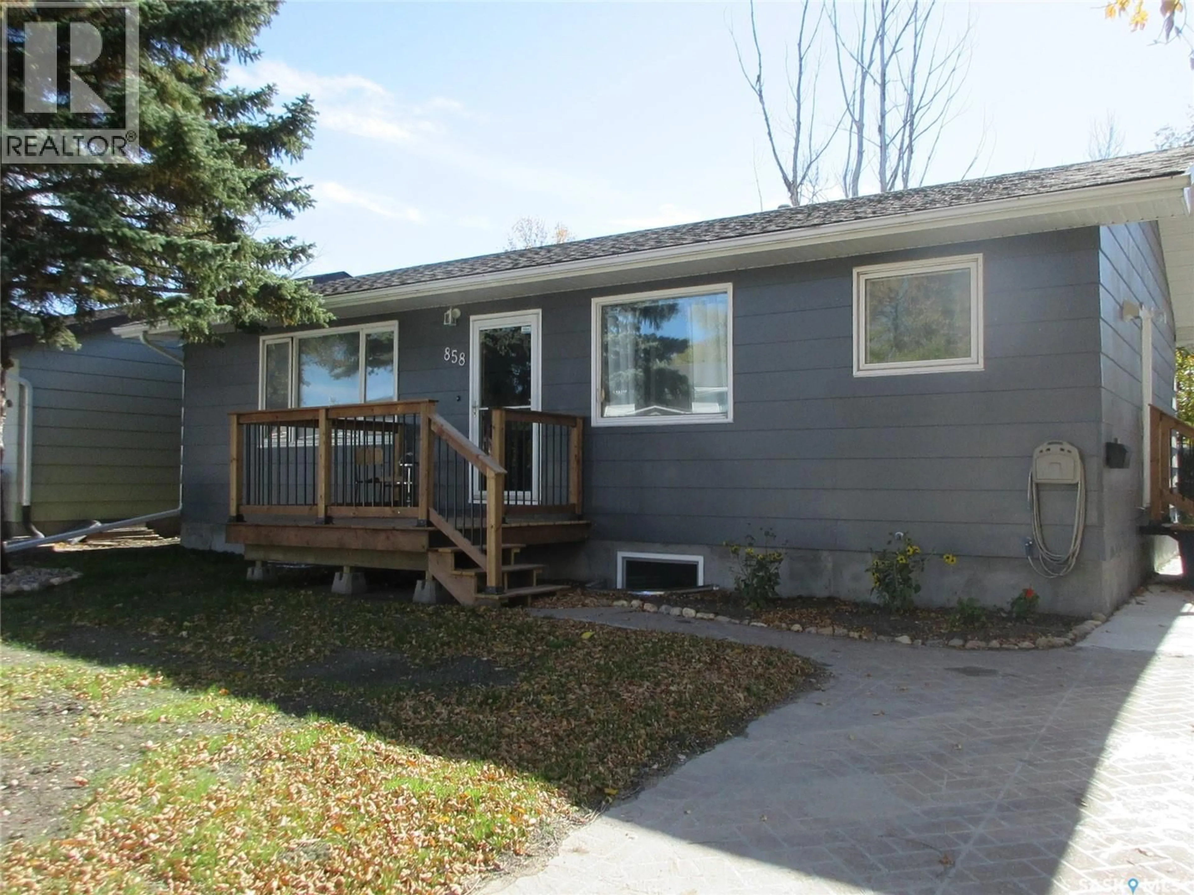Home with vinyl exterior material, street for 858 WOROBETZ CRESCENT, Regina Saskatchewan S4X2C3