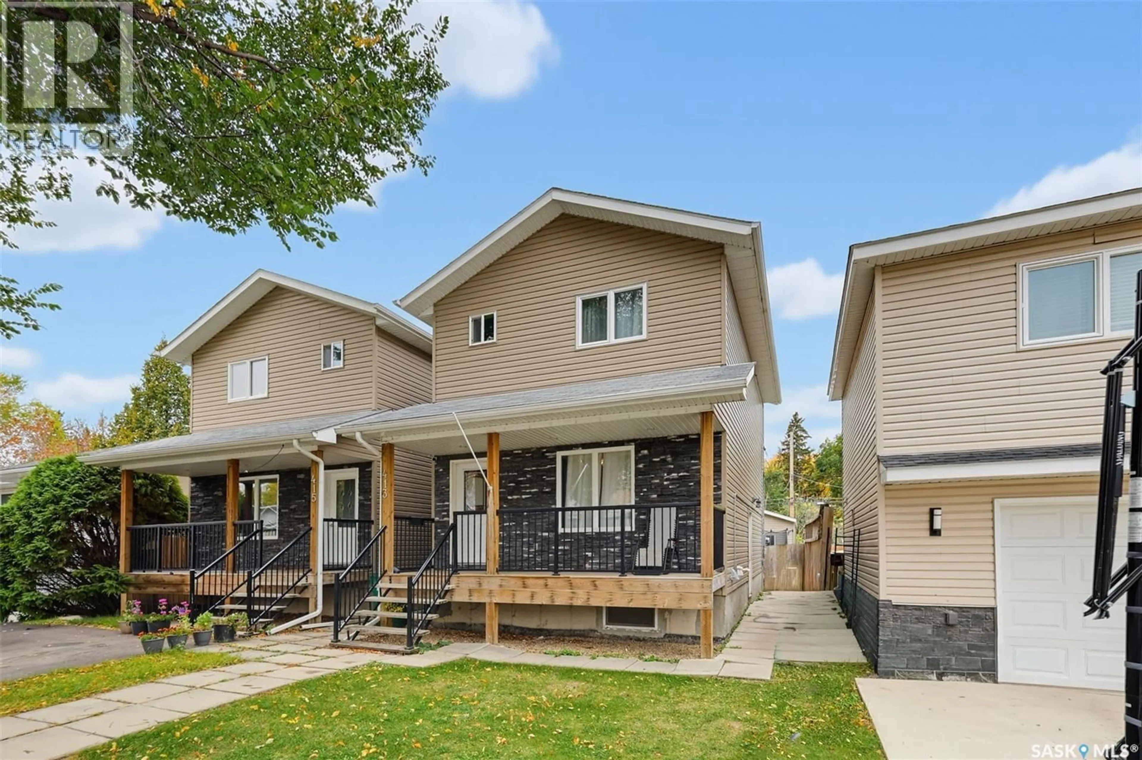 Home with vinyl exterior material, street for 413 X AVENUE, Saskatoon Saskatchewan S7M3H7
