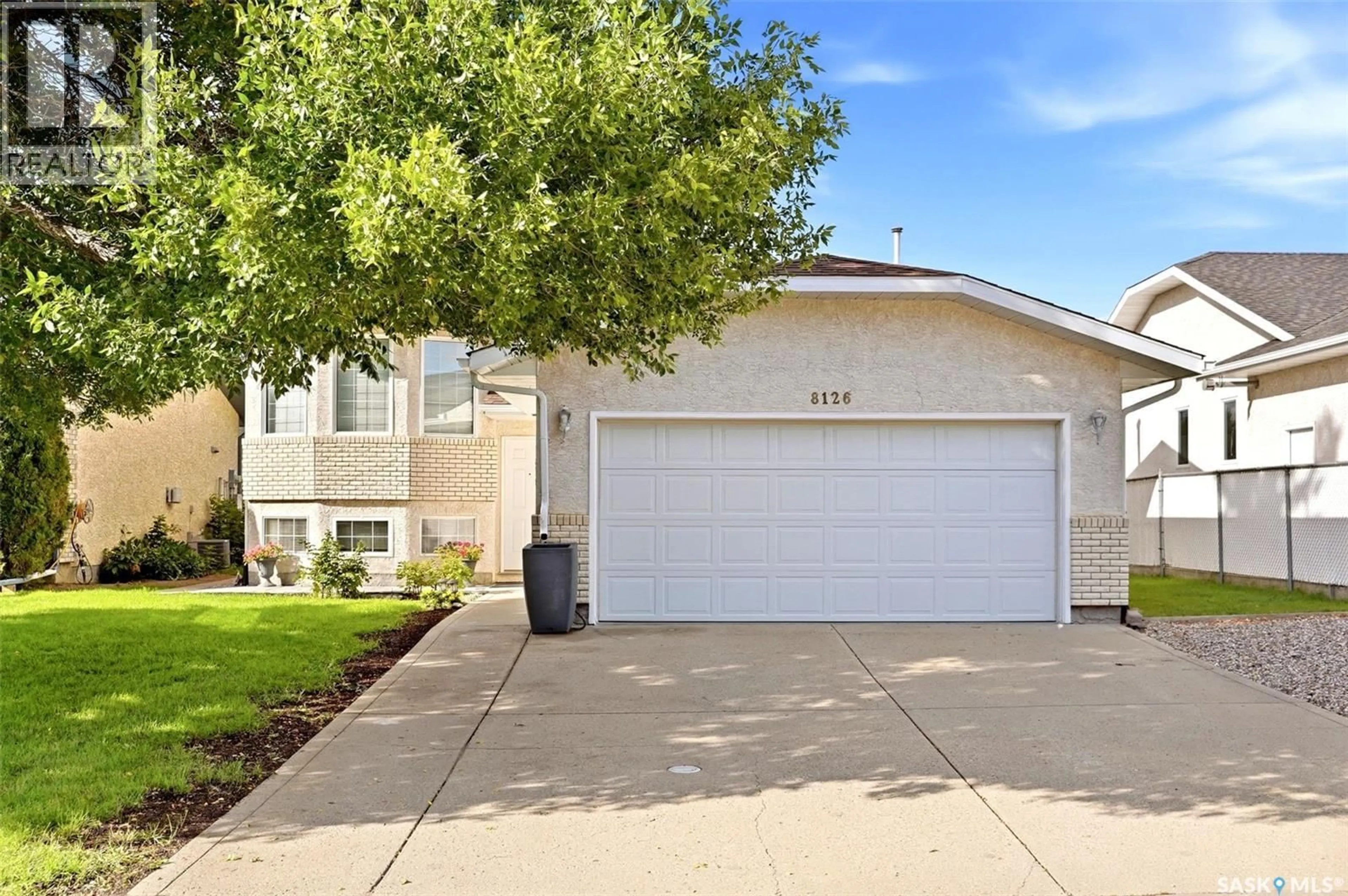 Home with vinyl exterior material, street for 8126 SHERWOOD DRIVE, Regina Saskatchewan S4Y1J6