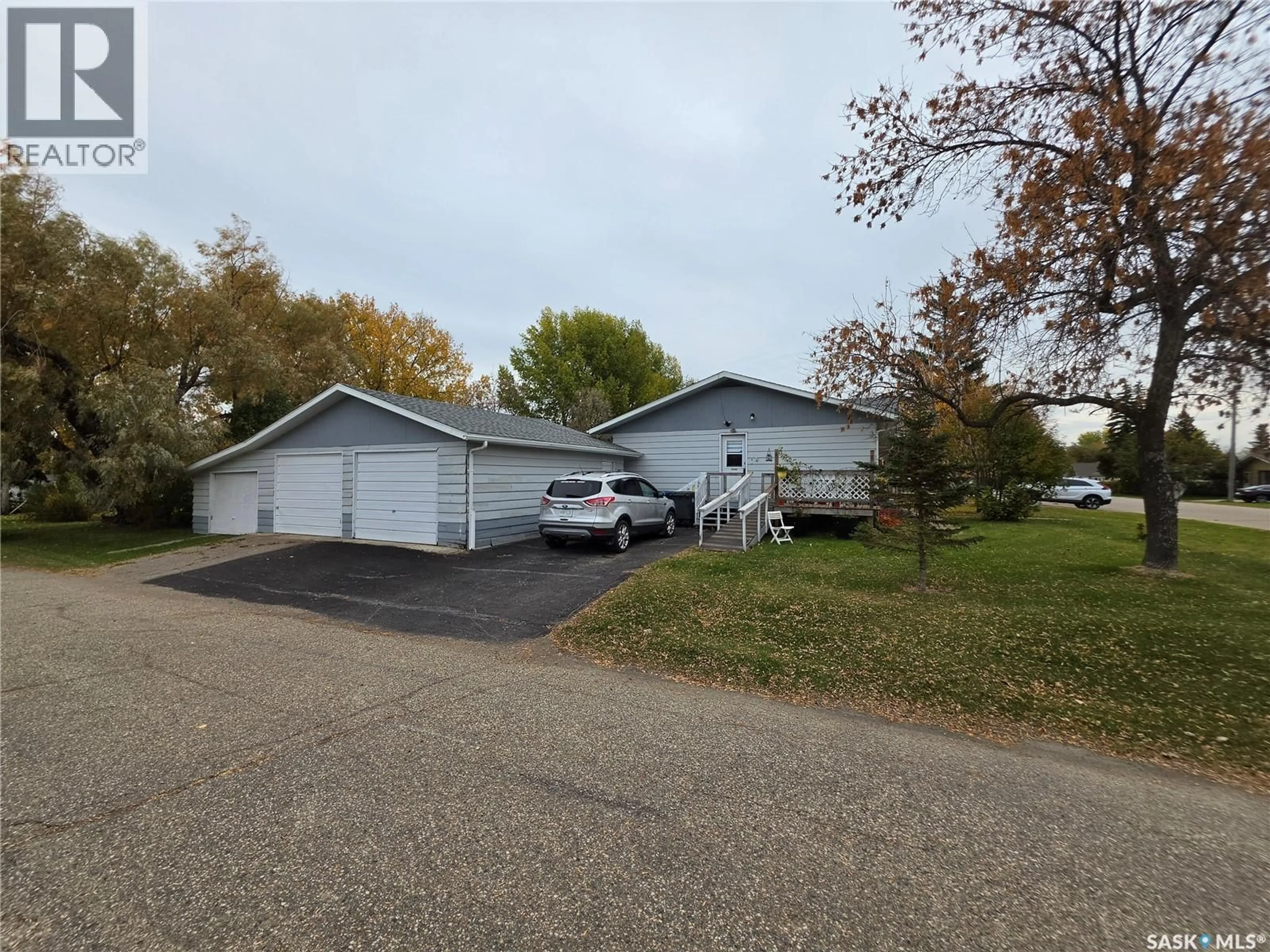A pic from outside/outdoor area/front of a property/back of a property/a pic from drone, street for 601 2ND AVENUE, Raymore Saskatchewan S0A3J0