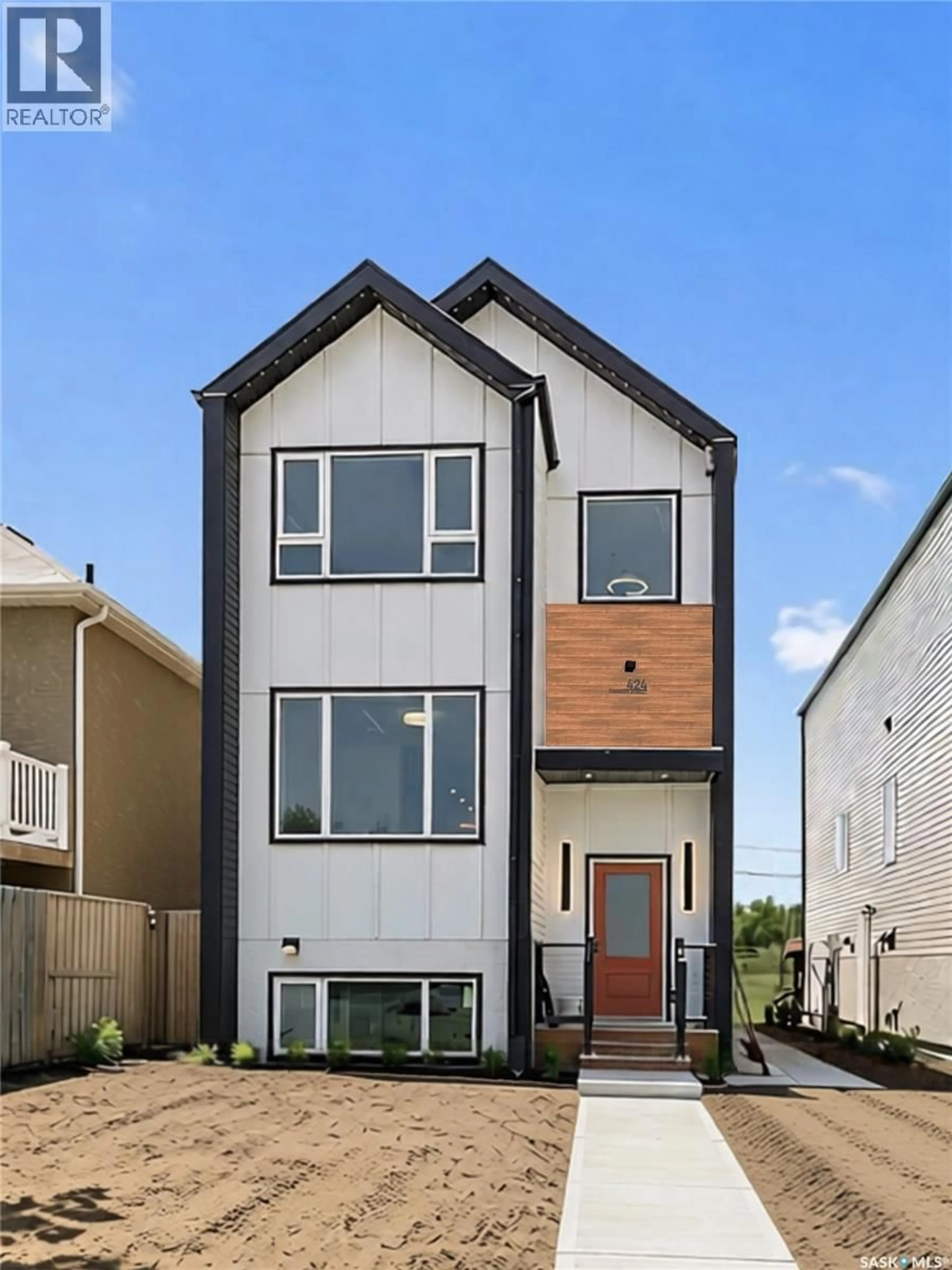Home with brick exterior material, street for 424 EMPRESS STREET, Saskatoon Saskatchewan S7K0Y1