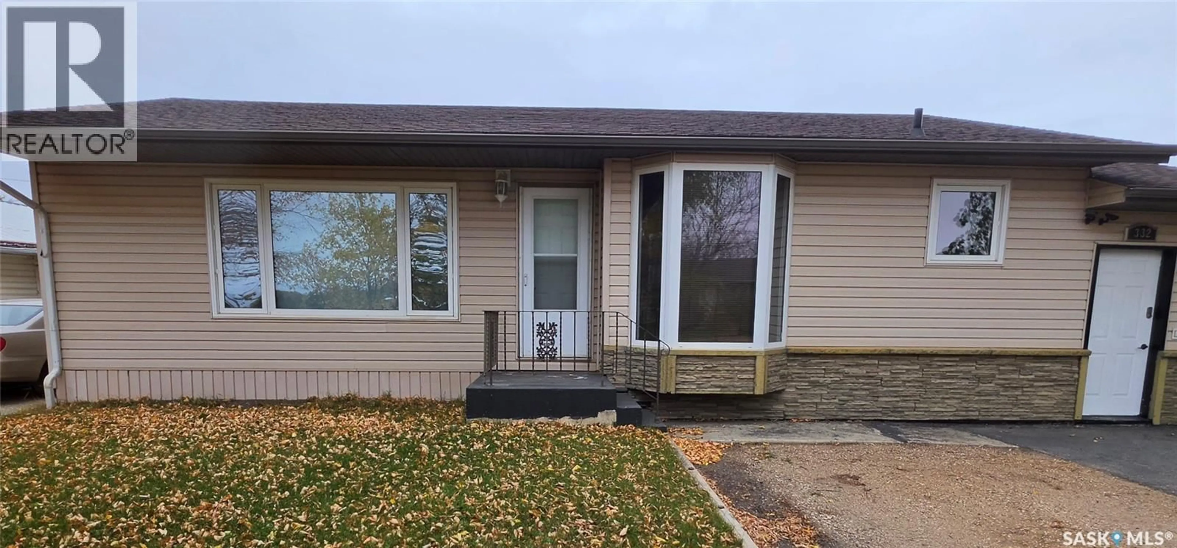Home with vinyl exterior material, street for 332 1ST AVENUE, Preeceville Saskatchewan S0A3B0