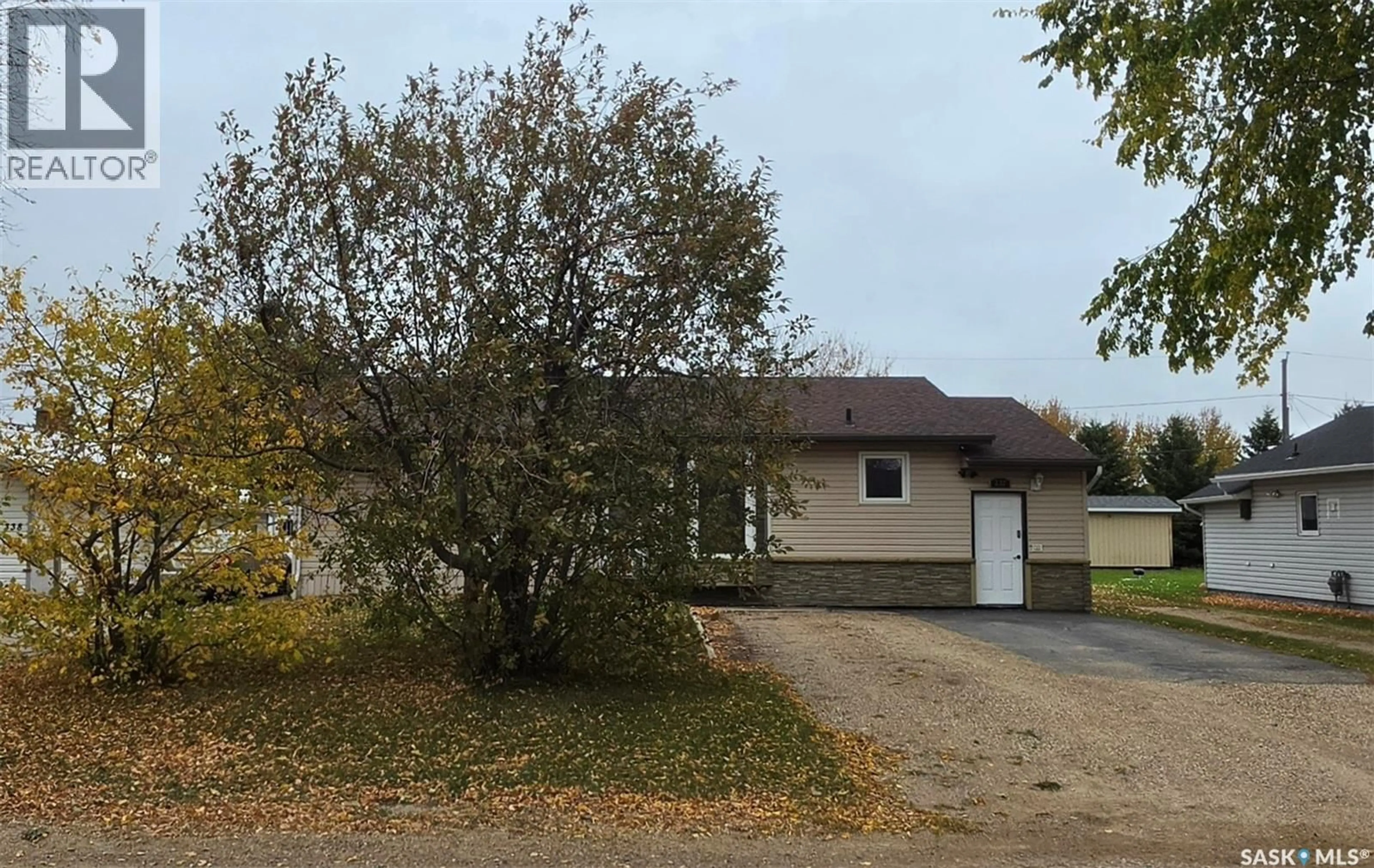 A pic from outside/outdoor area/front of a property/back of a property/a pic from drone, street for 332 1ST AVENUE, Preeceville Saskatchewan S0A3B0