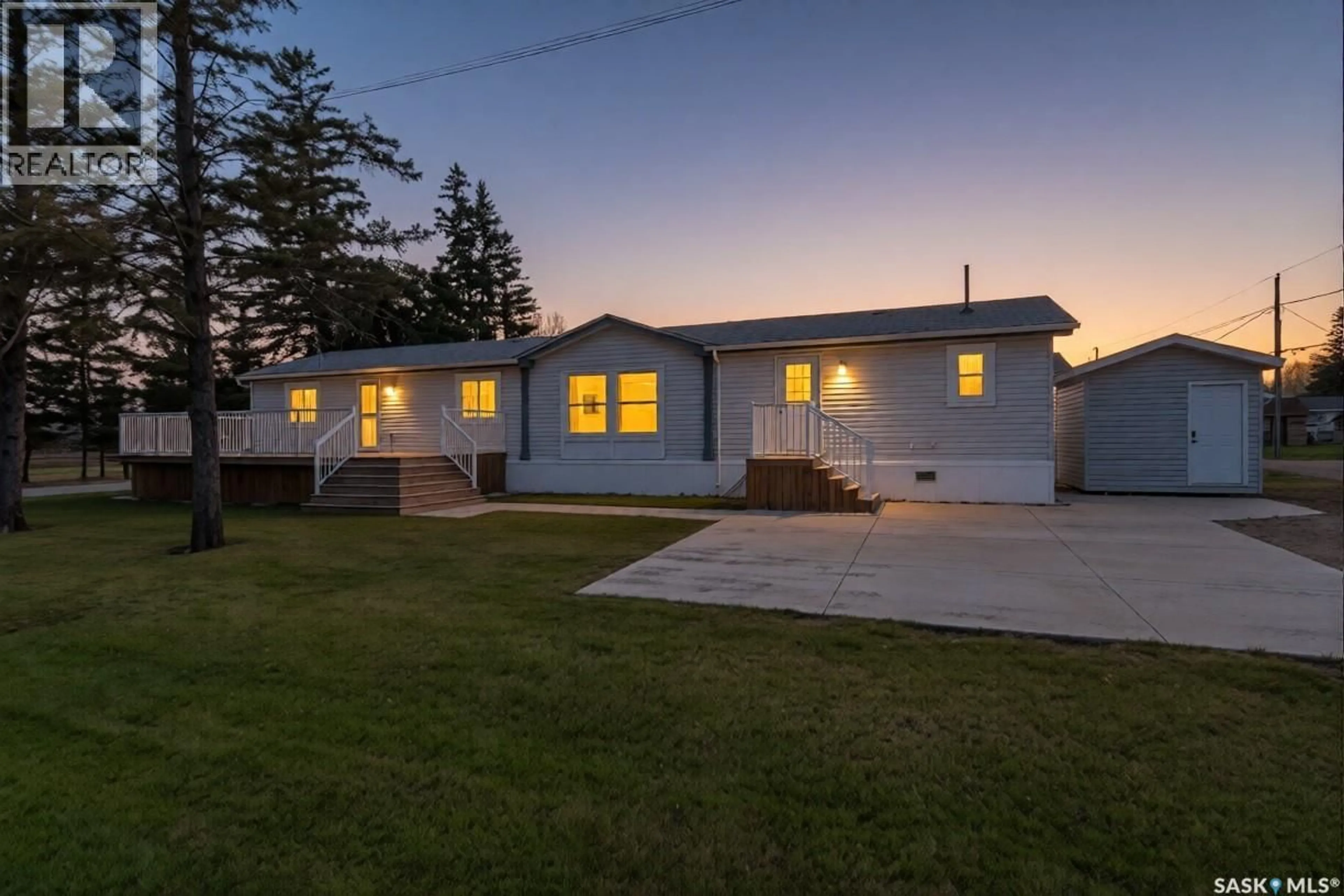 A pic from outside/outdoor area/front of a property/back of a property/a pic from drone, street for 119 RAILWAY AVENUE, Kinistino Saskatchewan S0J1H0