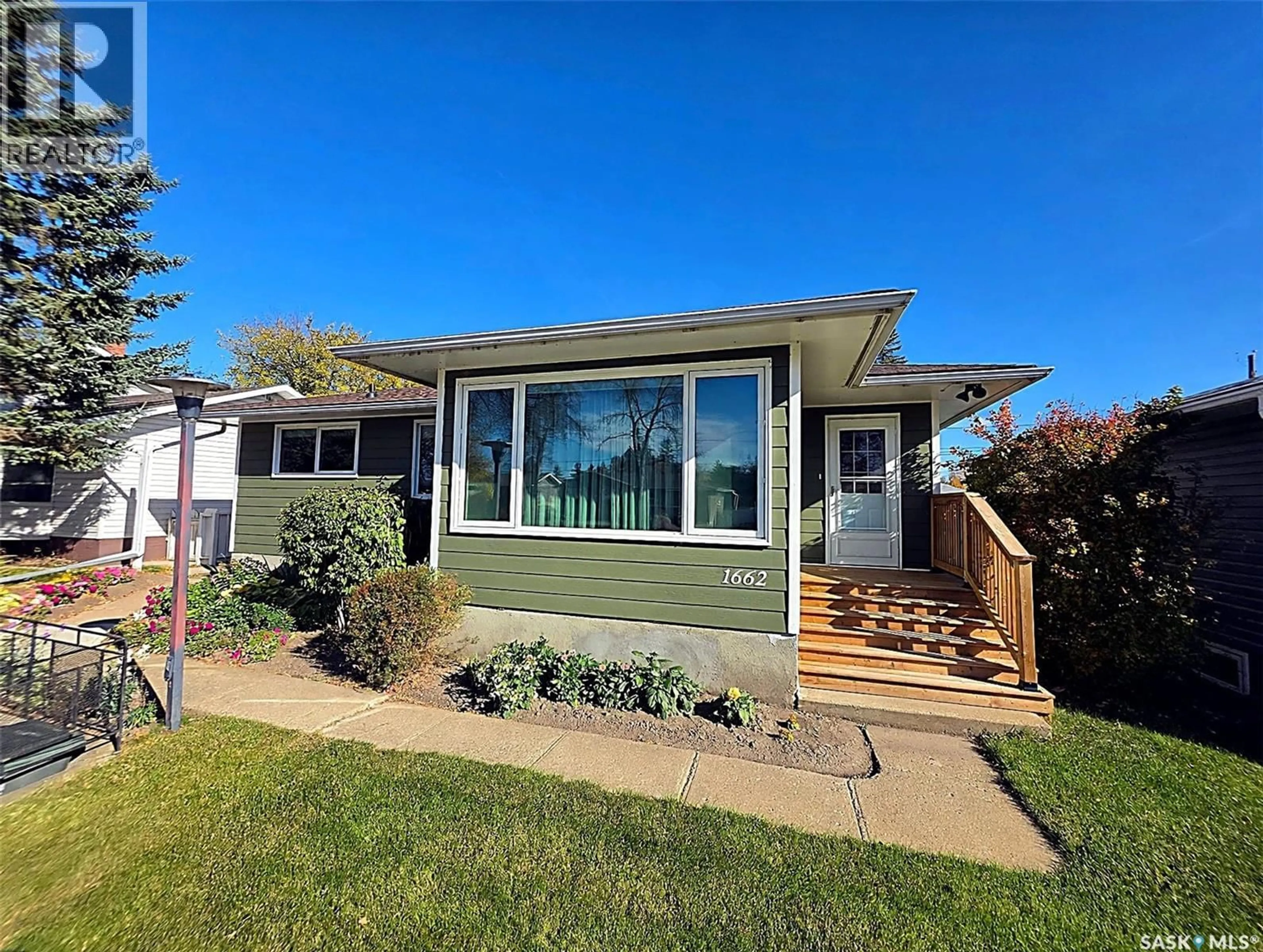 Home with vinyl exterior material, street for 1662 91ST STREET, North Battleford Saskatchewan S9A0A4