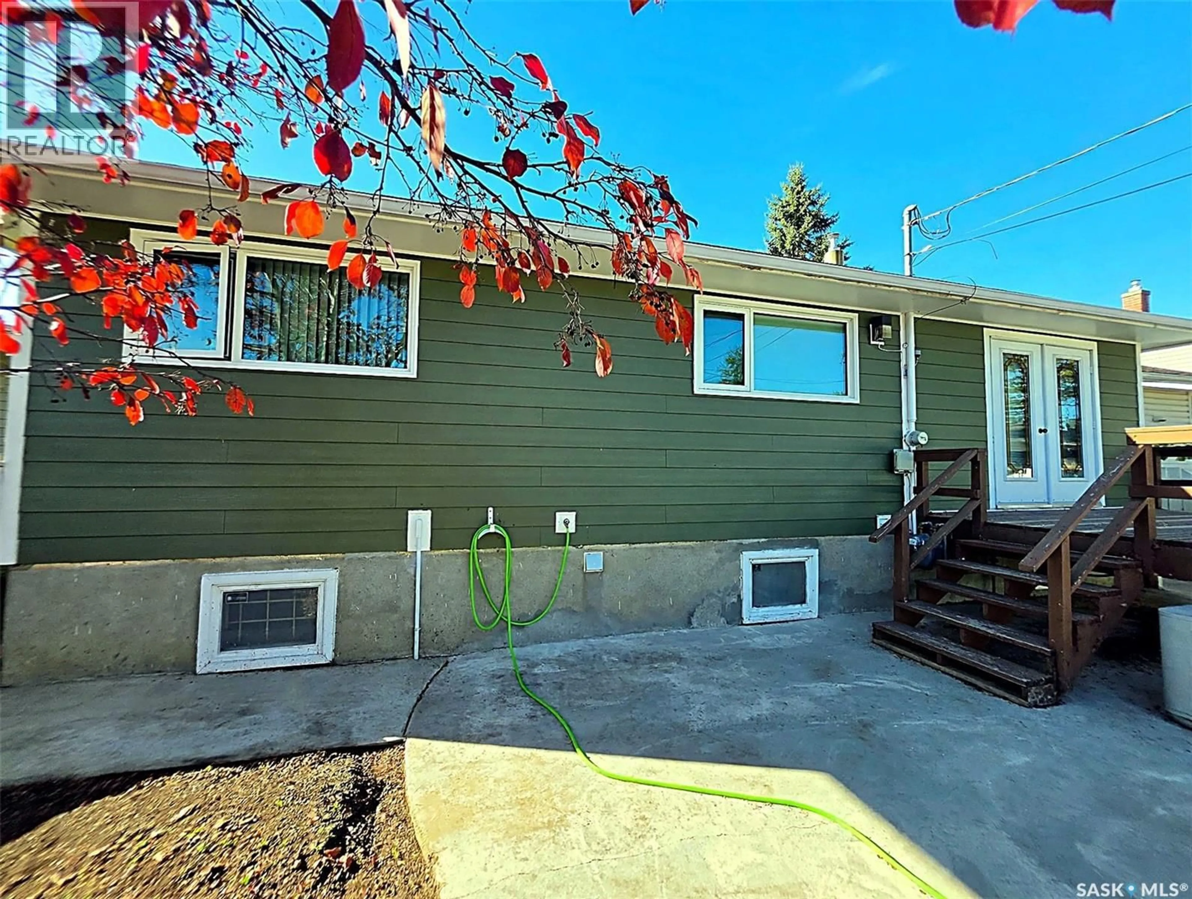 Home with vinyl exterior material, street for 1662 91ST STREET, North Battleford Saskatchewan S9A0A4