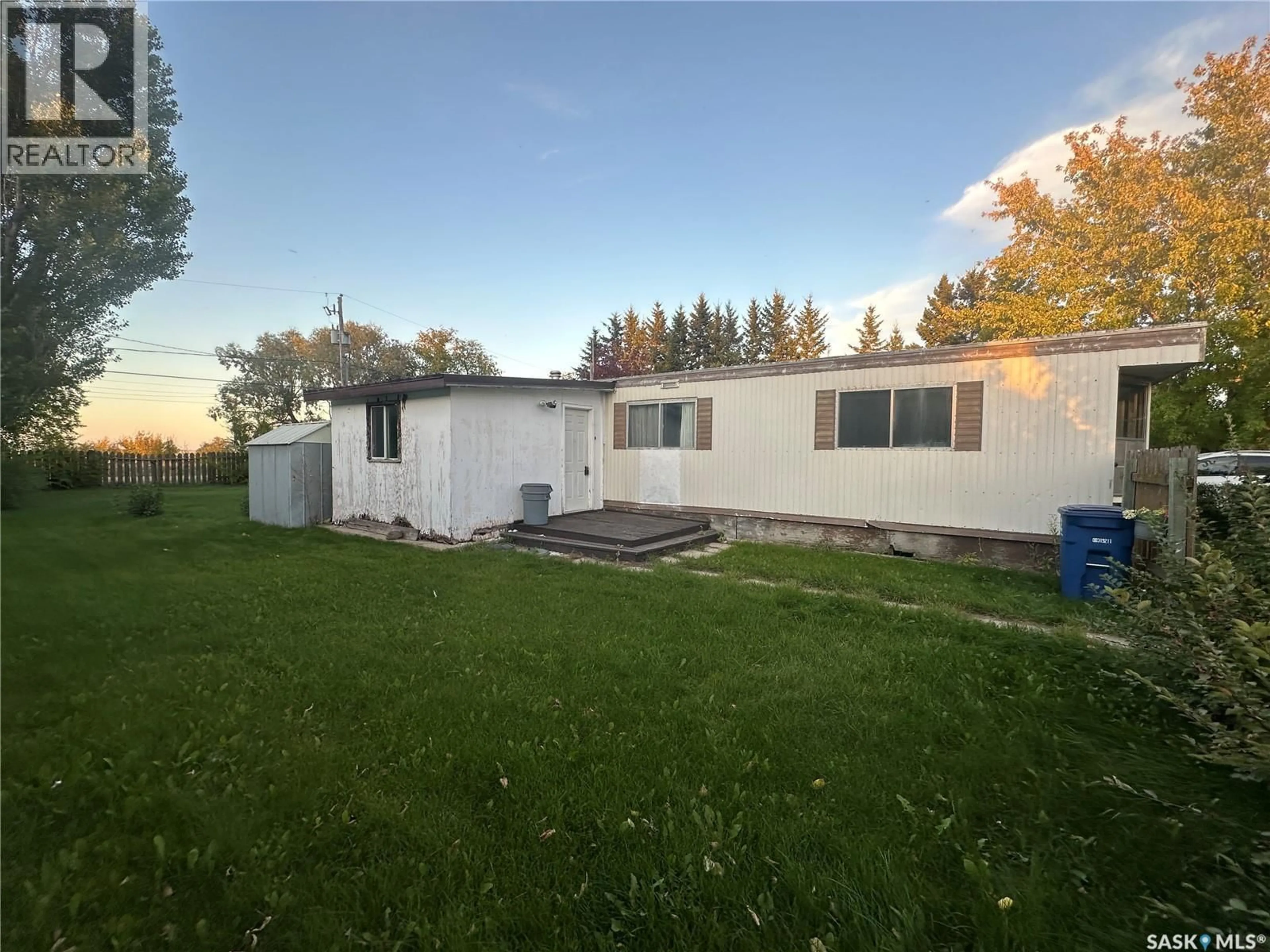 A pic from outside/outdoor area/front of a property/back of a property/a pic from drone, street for E - 624 LITTLE QUILL AVENUE, Wynyard Saskatchewan S0A4T0
