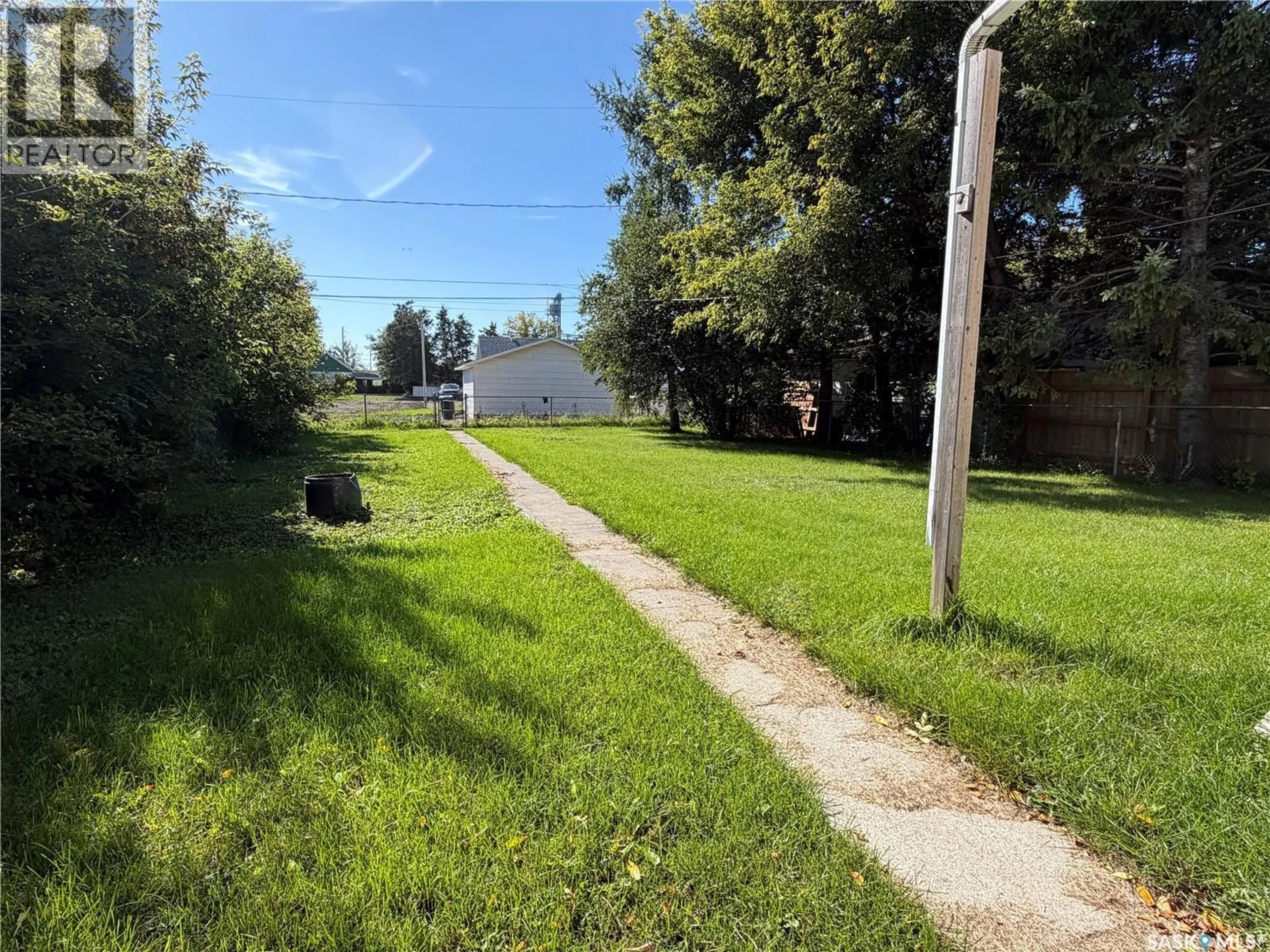 A pic from outside/outdoor area/front of a property/back of a property/a pic from drone, street for 3347 3RD AVENUE, Carrot River Saskatchewan S0E0L0