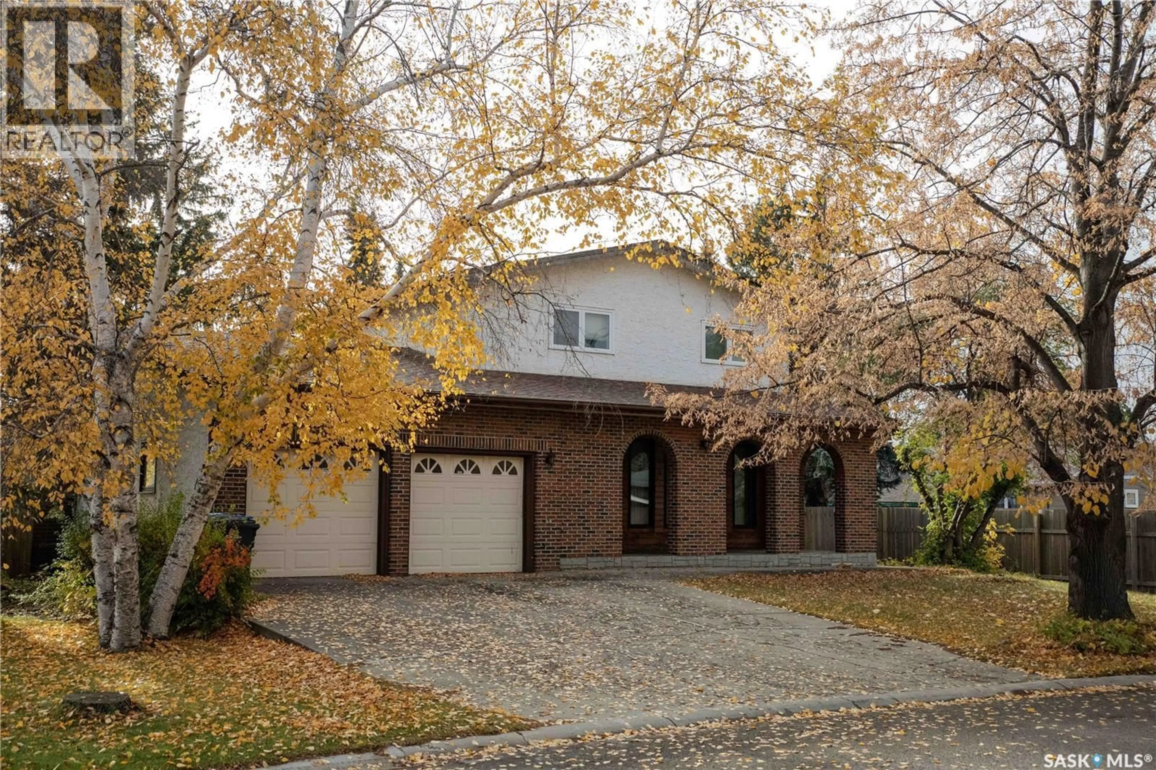 Home with brick exterior material, street for 10802 MEIGHEN CRESCENT, North Battleford Saskatchewan S9A3L3