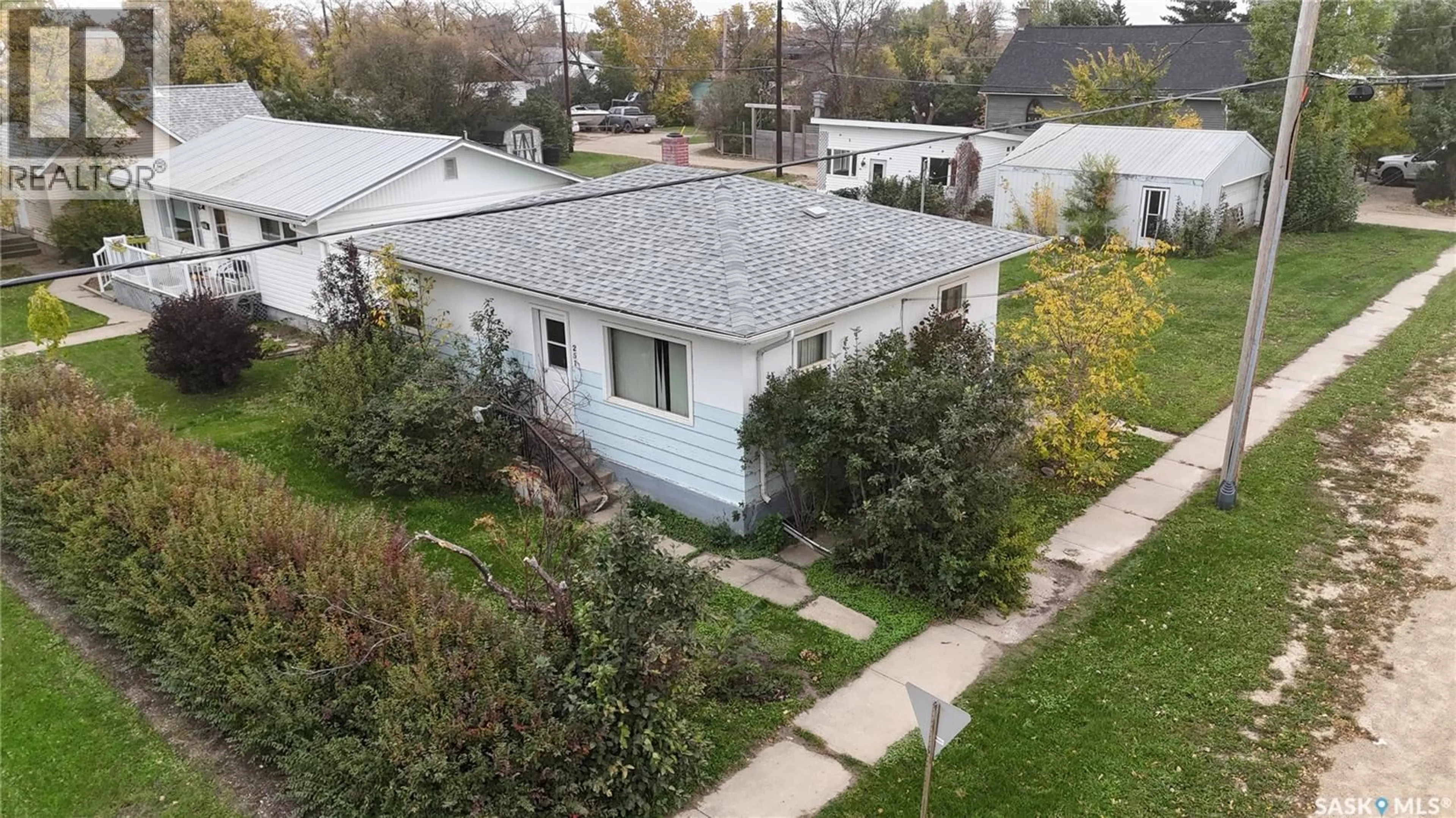 A pic from outside/outdoor area/front of a property/back of a property/a pic from drone, street for 251 5TH STREET, Craik Saskatchewan S0G0V0