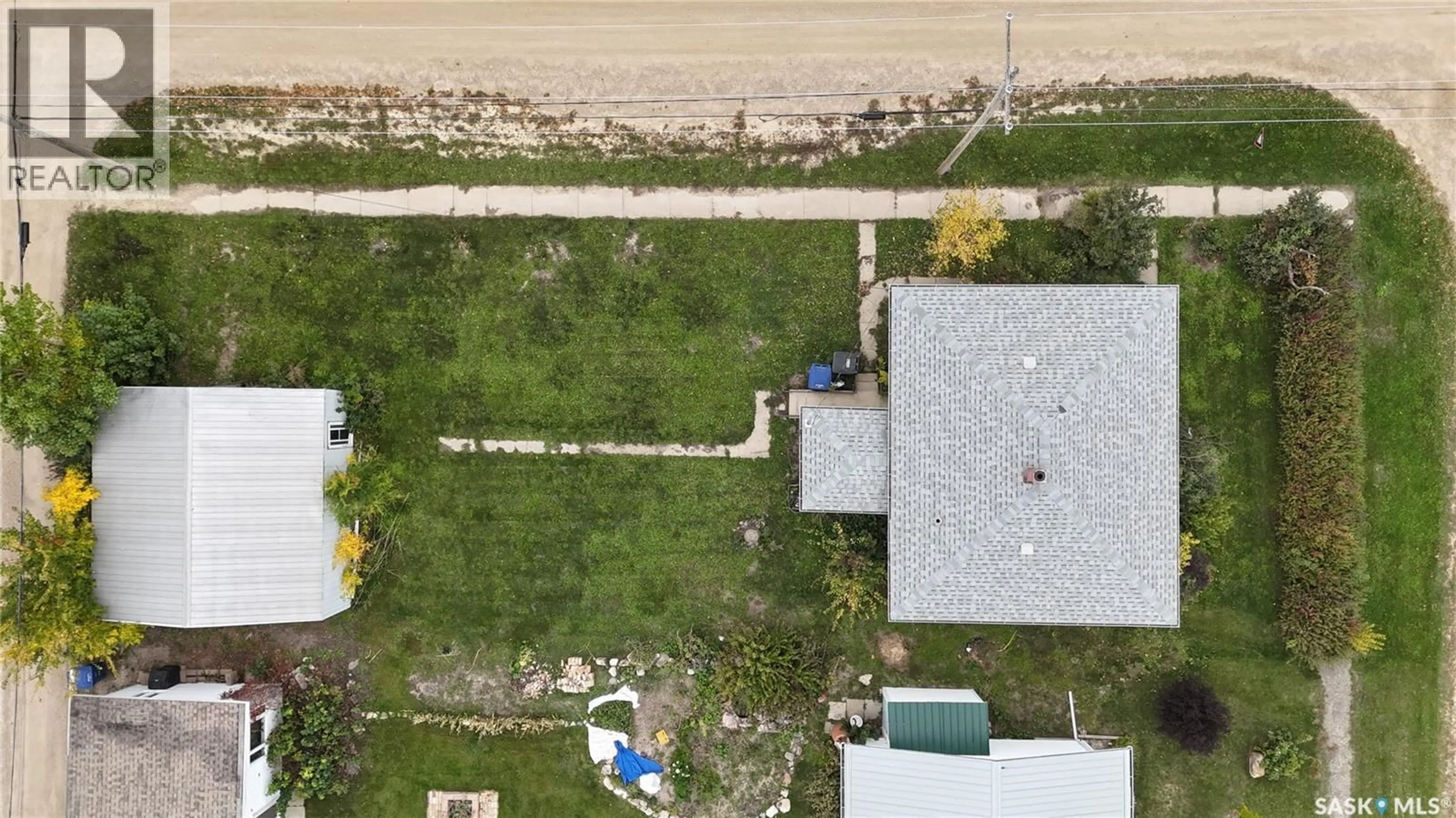 A pic from outside/outdoor area/front of a property/back of a property/a pic from drone, street for 251 5TH STREET, Craik Saskatchewan S0G0V0