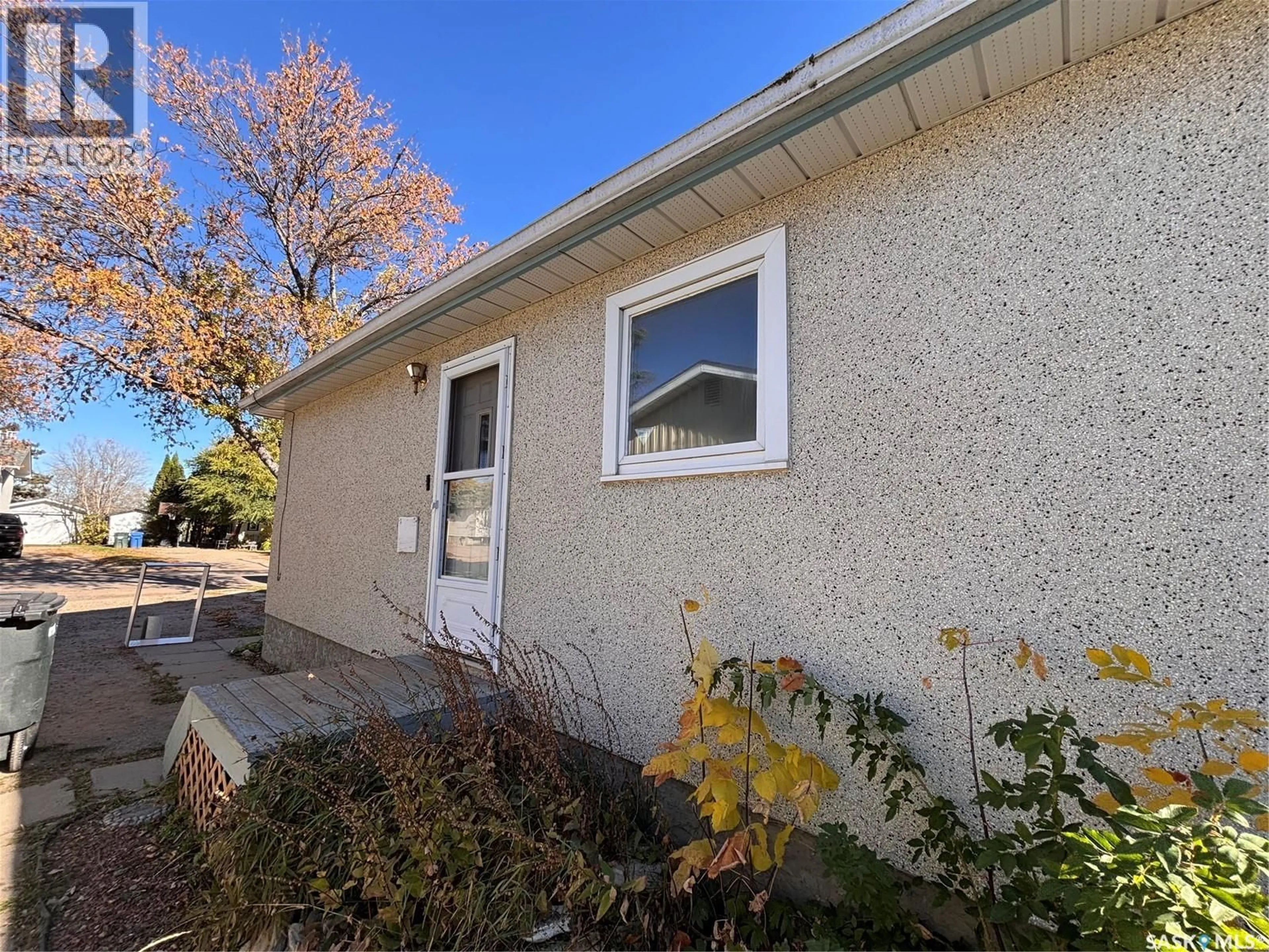 Home with vinyl exterior material, street for 1711 13TH STREET, Prince Albert Saskatchewan S6V3K2