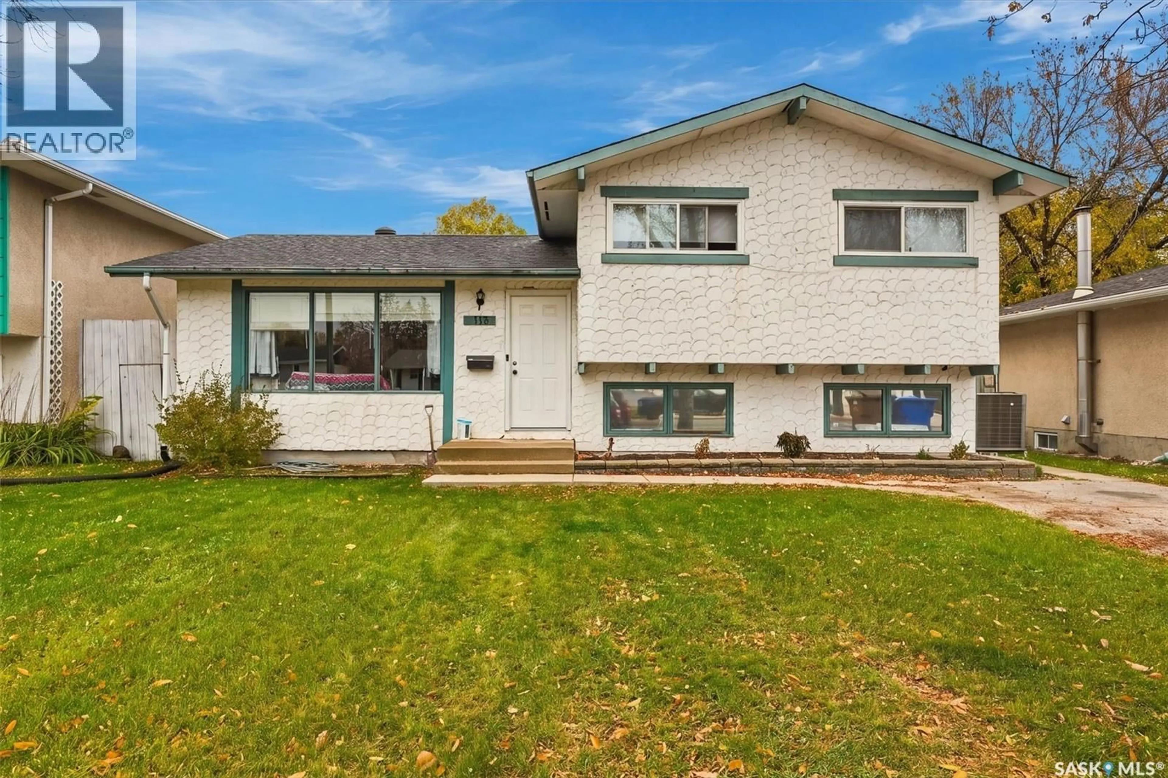 Home with vinyl exterior material, street for 119 MCCARTHY BOULEVARD, Regina Saskatchewan S4R5R6